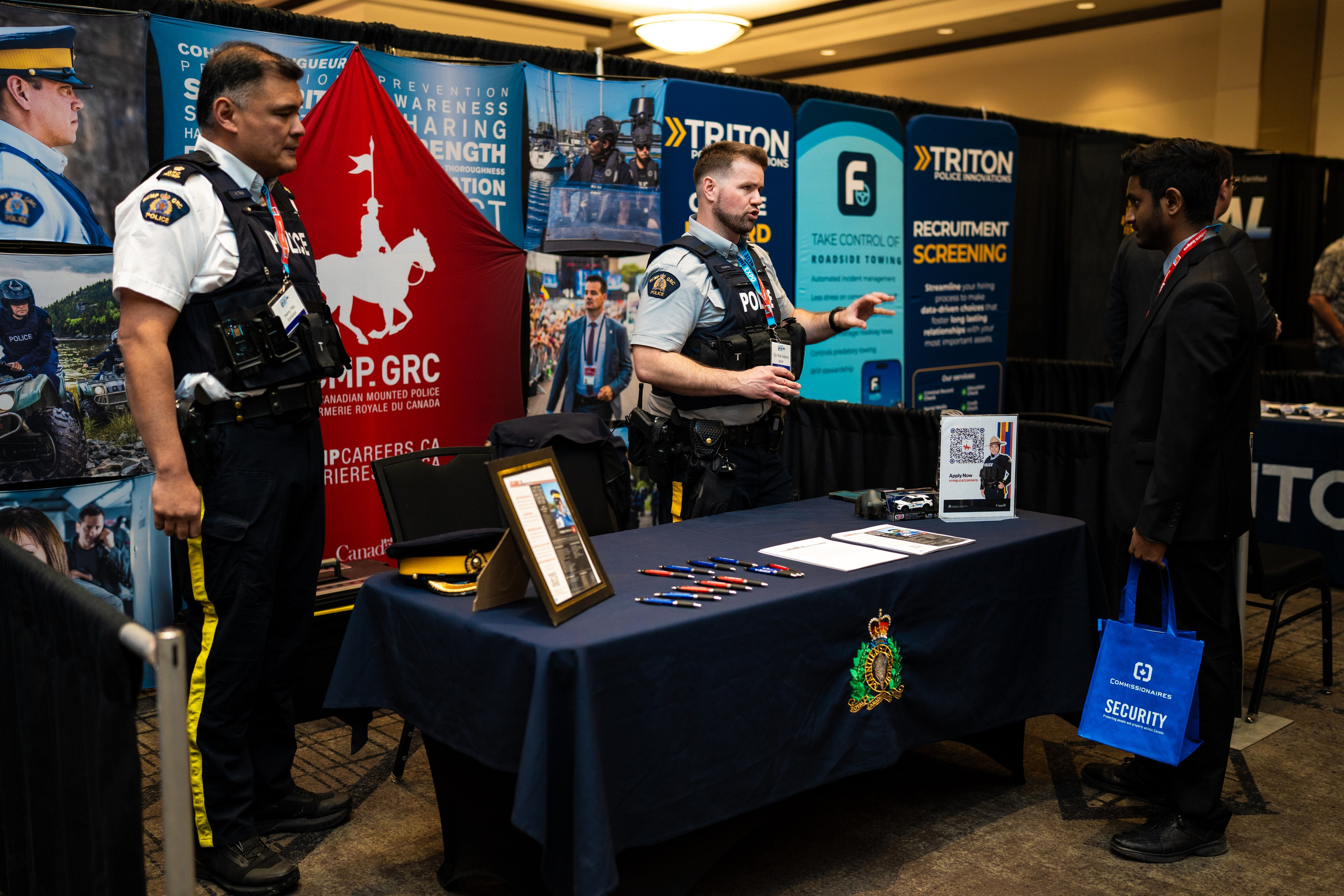 Exhibitor booth with hats and apparel display, Blueline Expo 2026