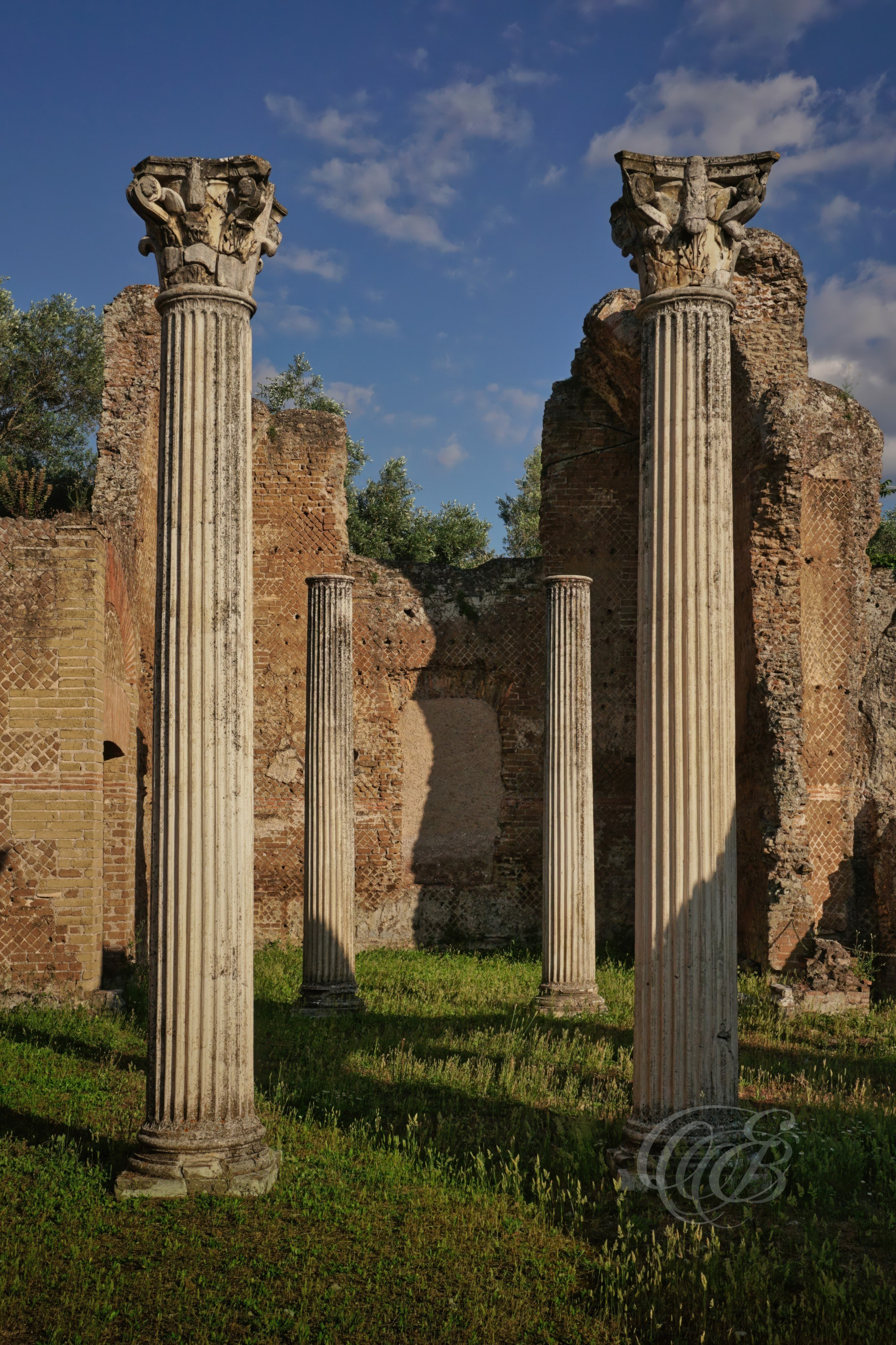 ITALY PHOTOGRAPHY — Columns of the Golden Square at Hadrian's Villa — The surviving columns of the Golden Square at Hadrian's Villa, reflecting the grandeur of one of the Roman Empire's most remarkable imperial residences near Tivoli, Rome, Italy — Eduardo Bartoli Photography.