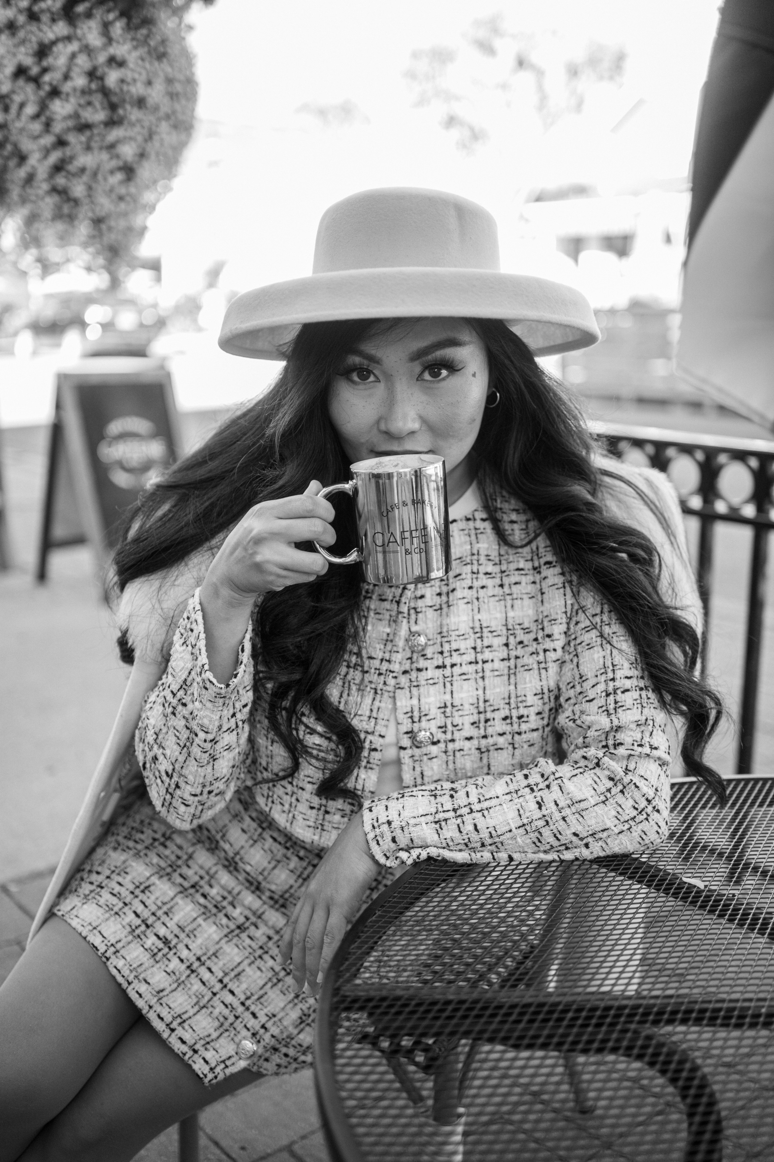 Dynamic photoshoot in a Windsor café, focusing on creative portrait photography for a relaxed and artistic vibe.