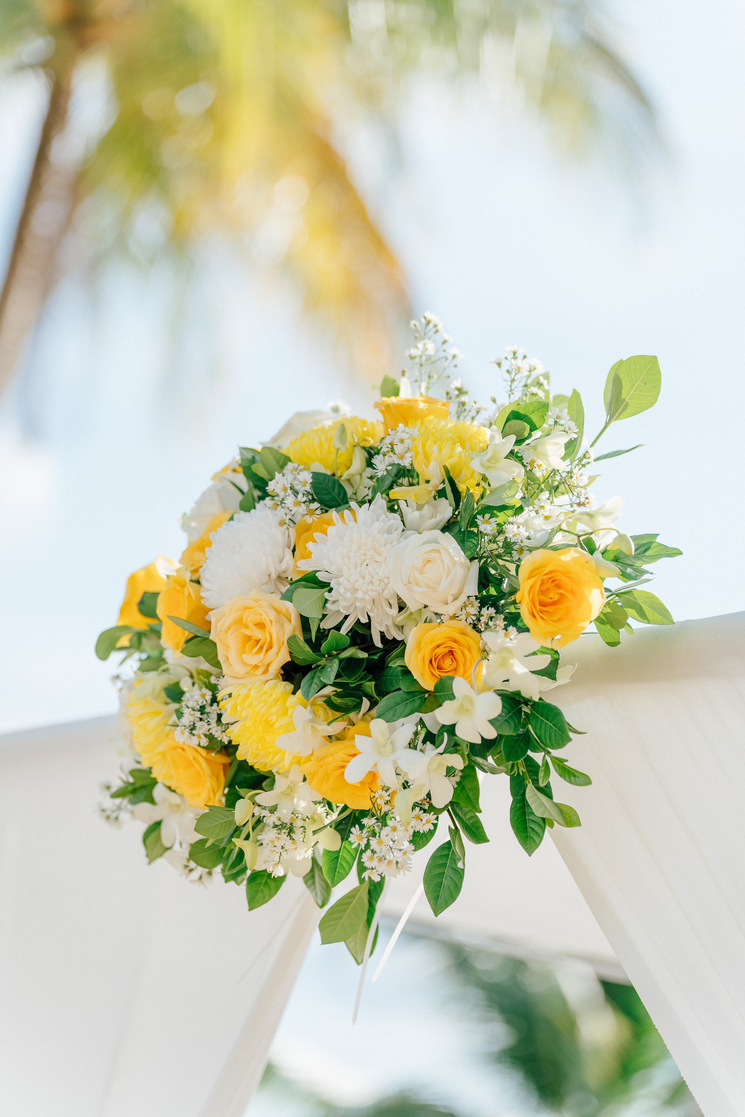 Romantic Buddhist wedding ceremony with guests in Koh Samui, Thailand