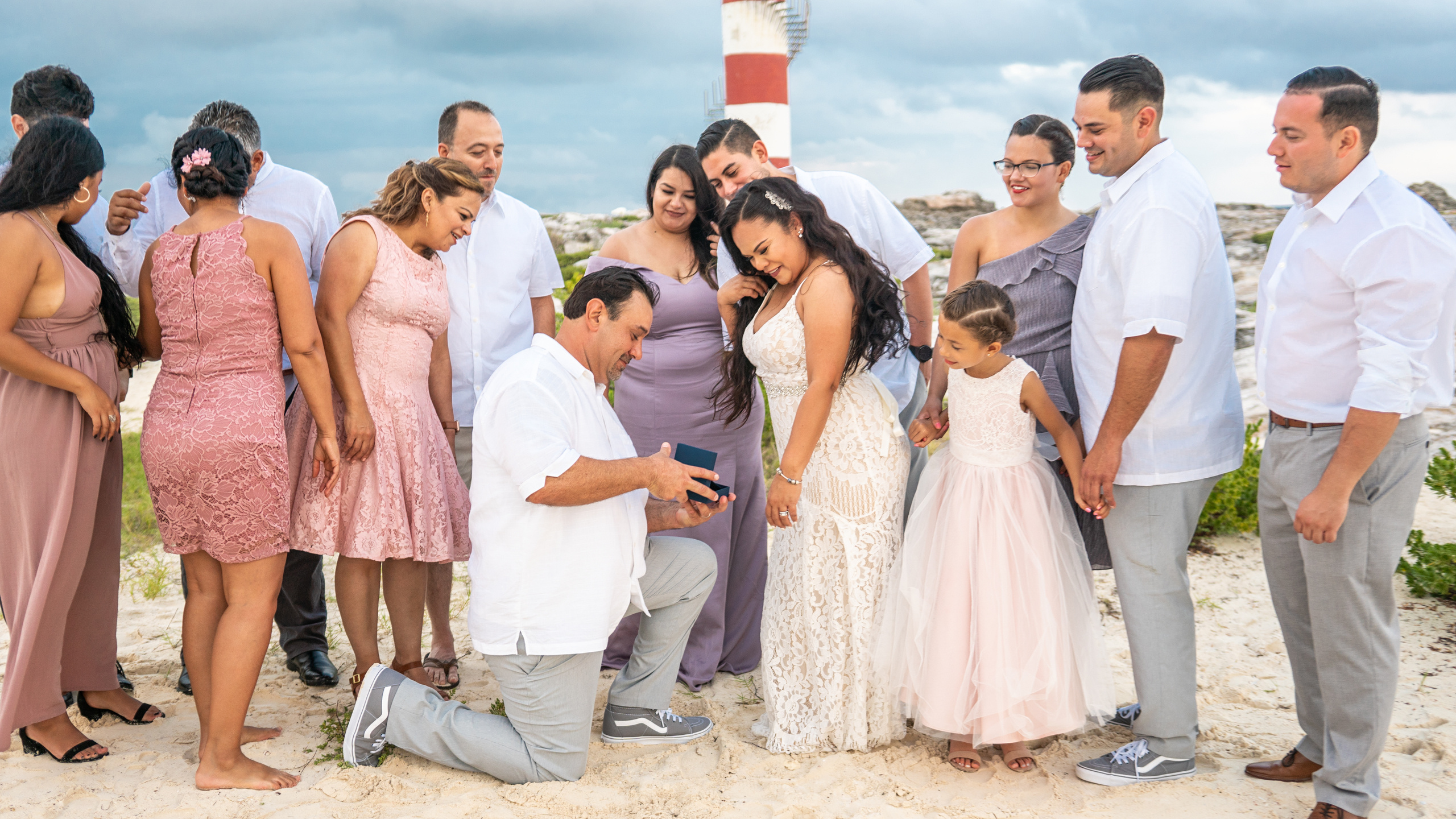 Candid group wedding portrait by the sea in Playa del Carmen