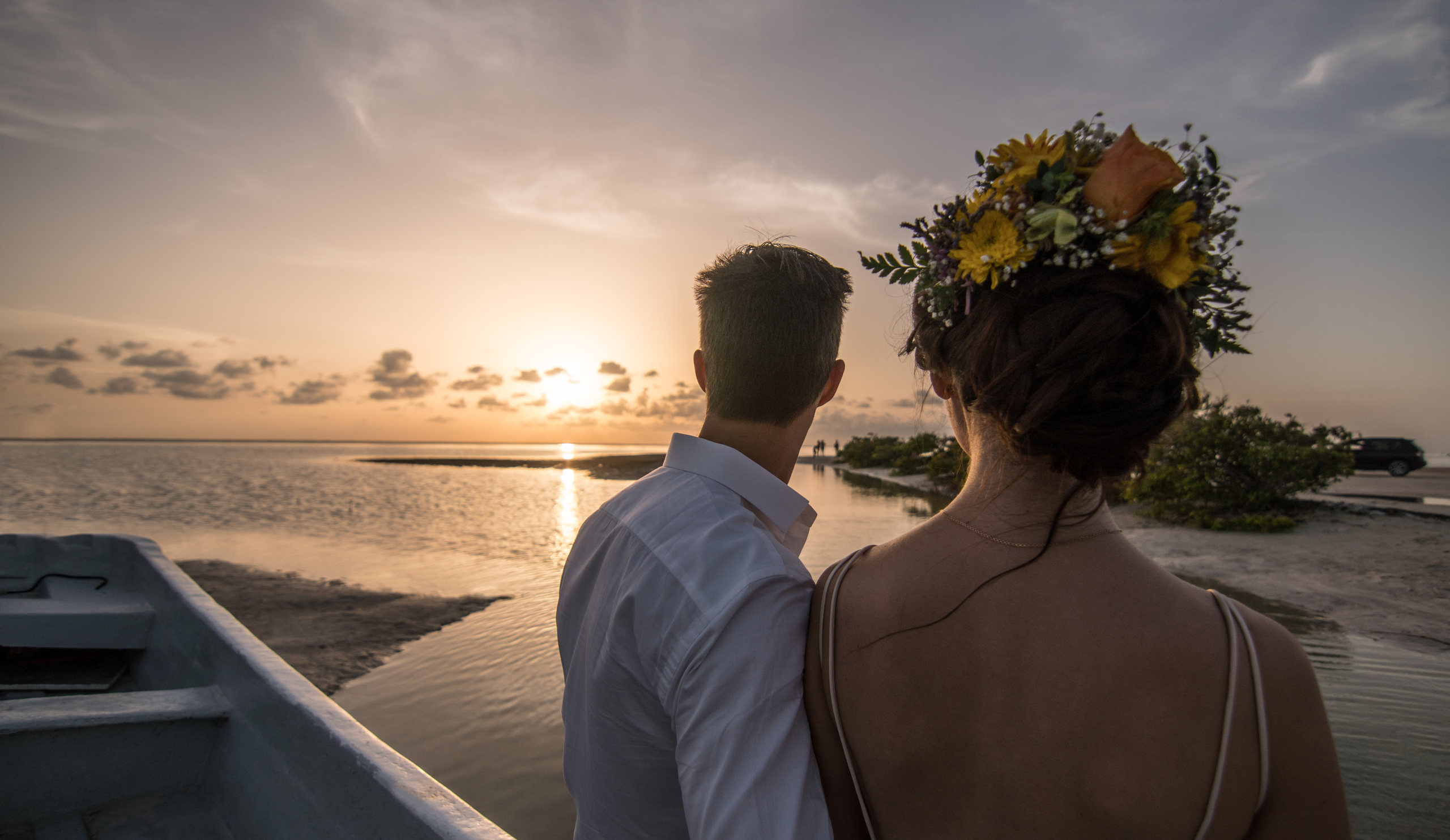 Couple in love by the water during rustic beach wedding in Yucatán