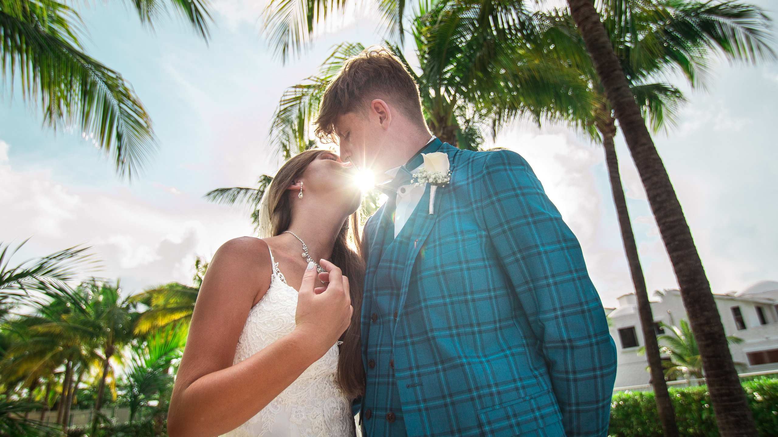 Candid wedding moment on a rocky beach in Mexico by Photographer in Mexico
