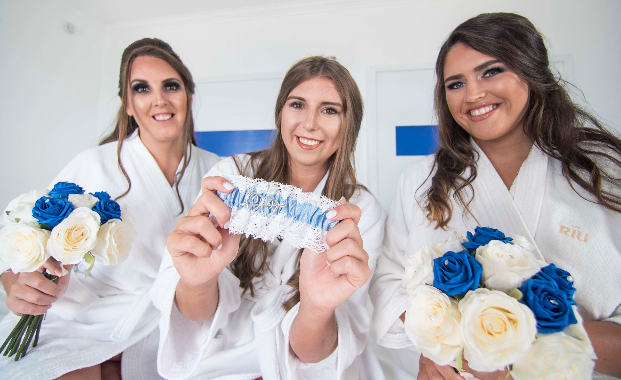 Destination bride celebrating with bridesmaids in Cancun