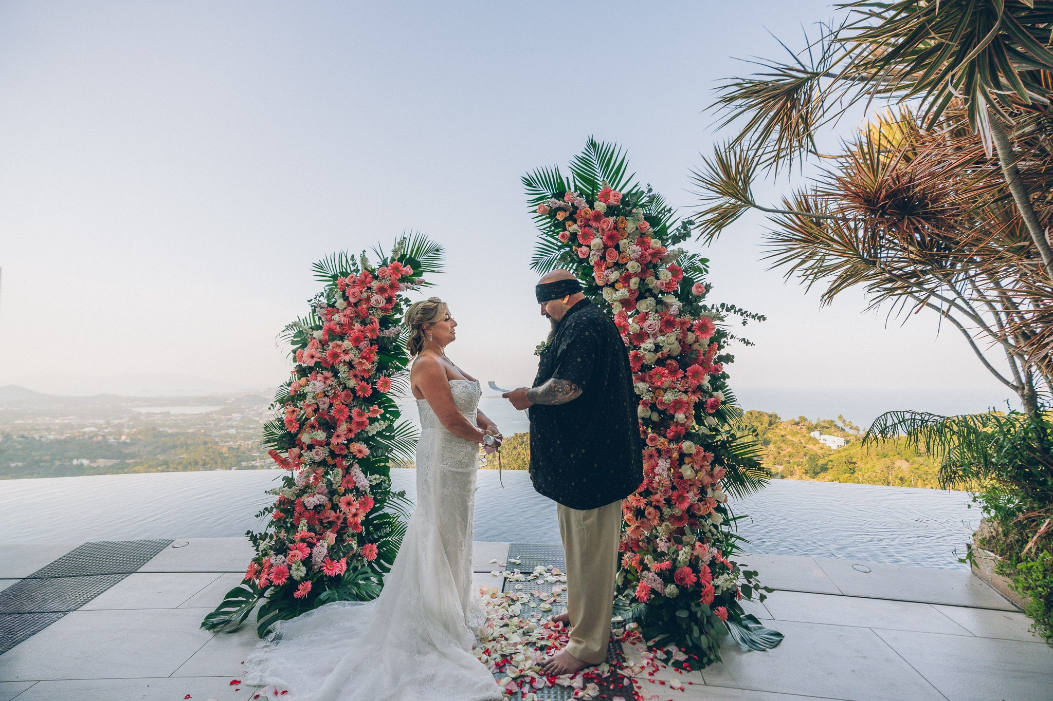 Bride and groom celebrating a sunset wedding at a villa in Koh Samui