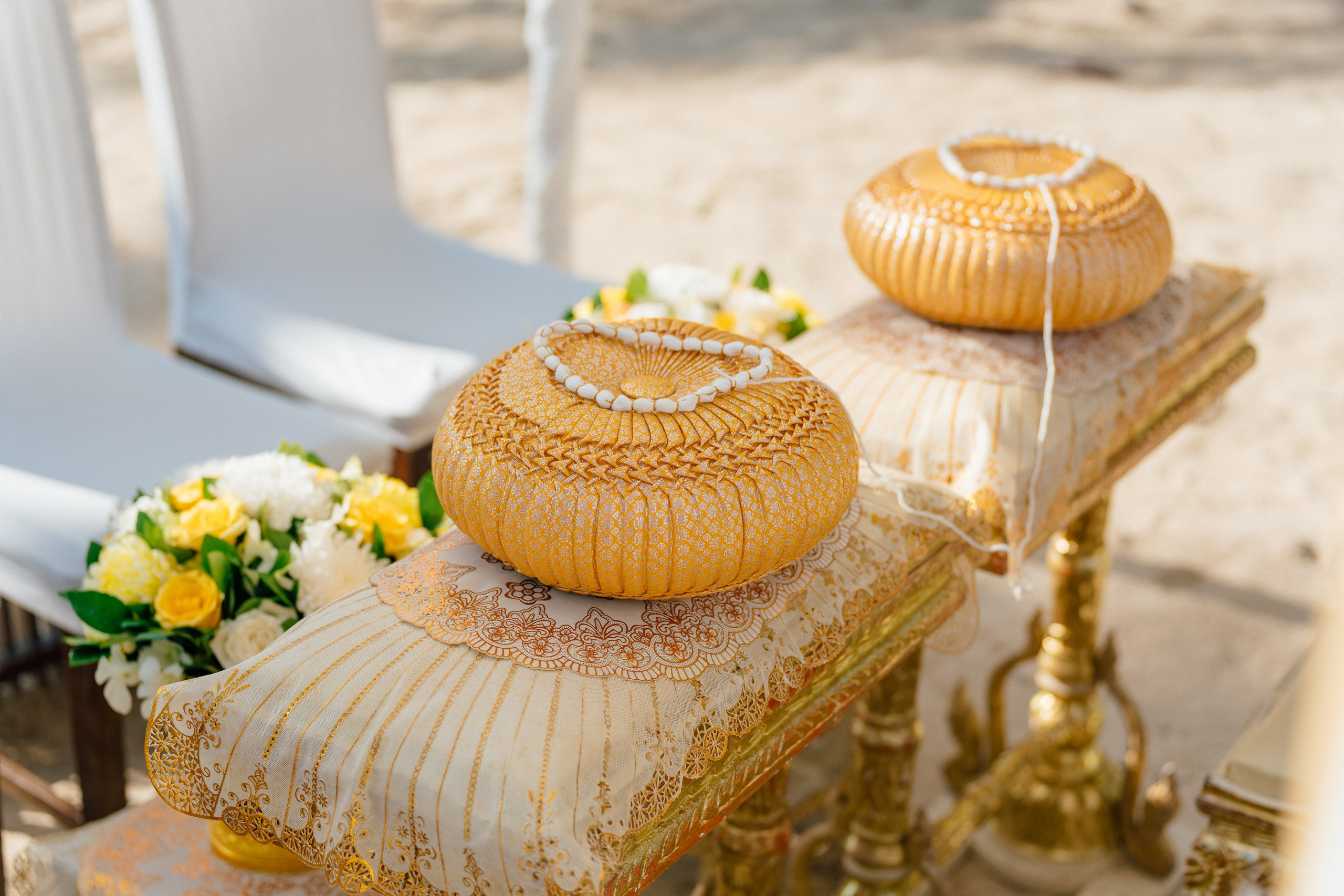 Couple celebrating a spiritual Buddhist wedding ceremony on Koh Samui