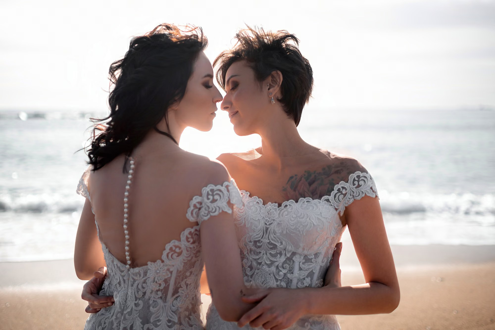 Sunset photoshoot Punta Cana featuring an engaged couple on a tropical beach.