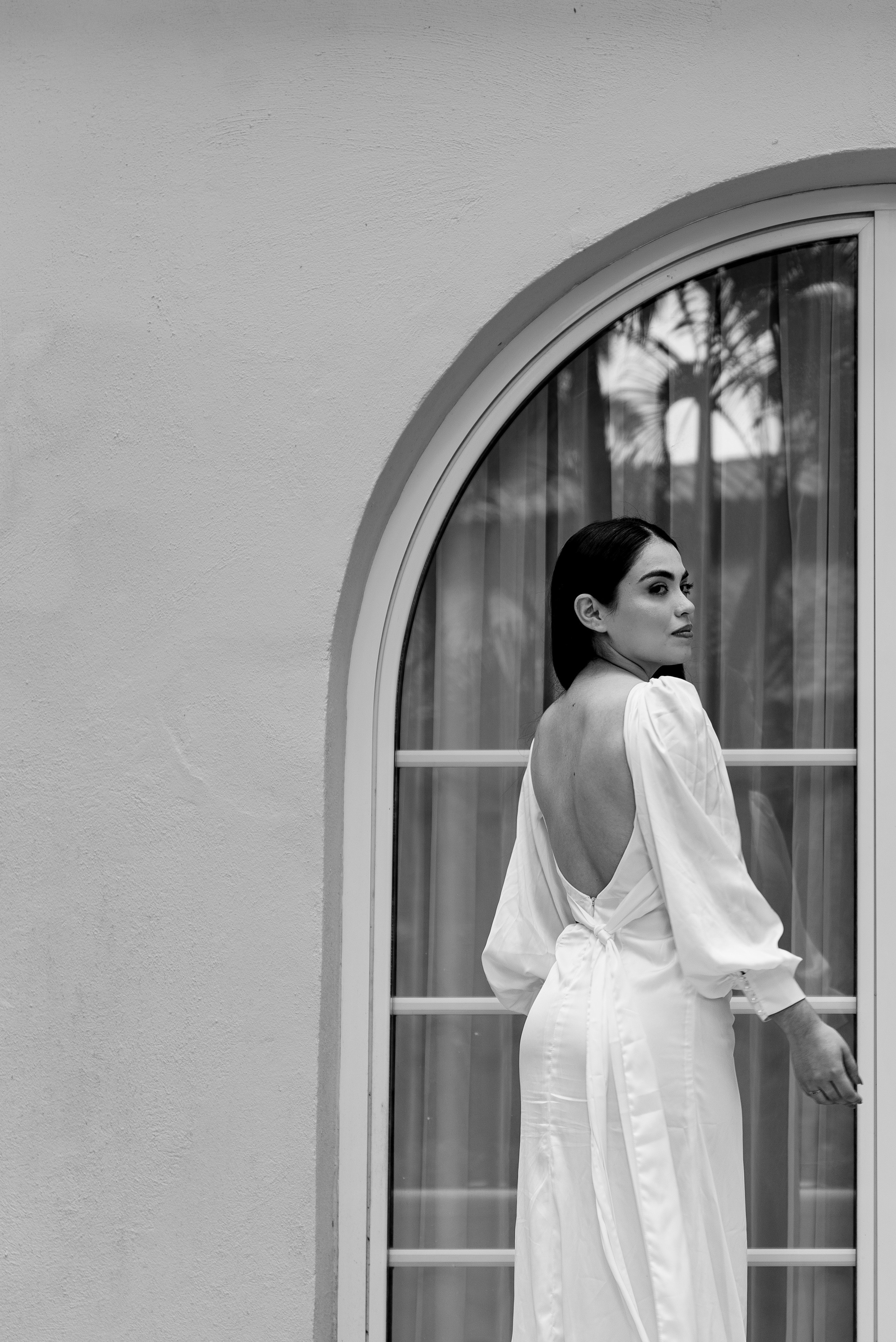 Bride showing off her dress at Hotel El Prado