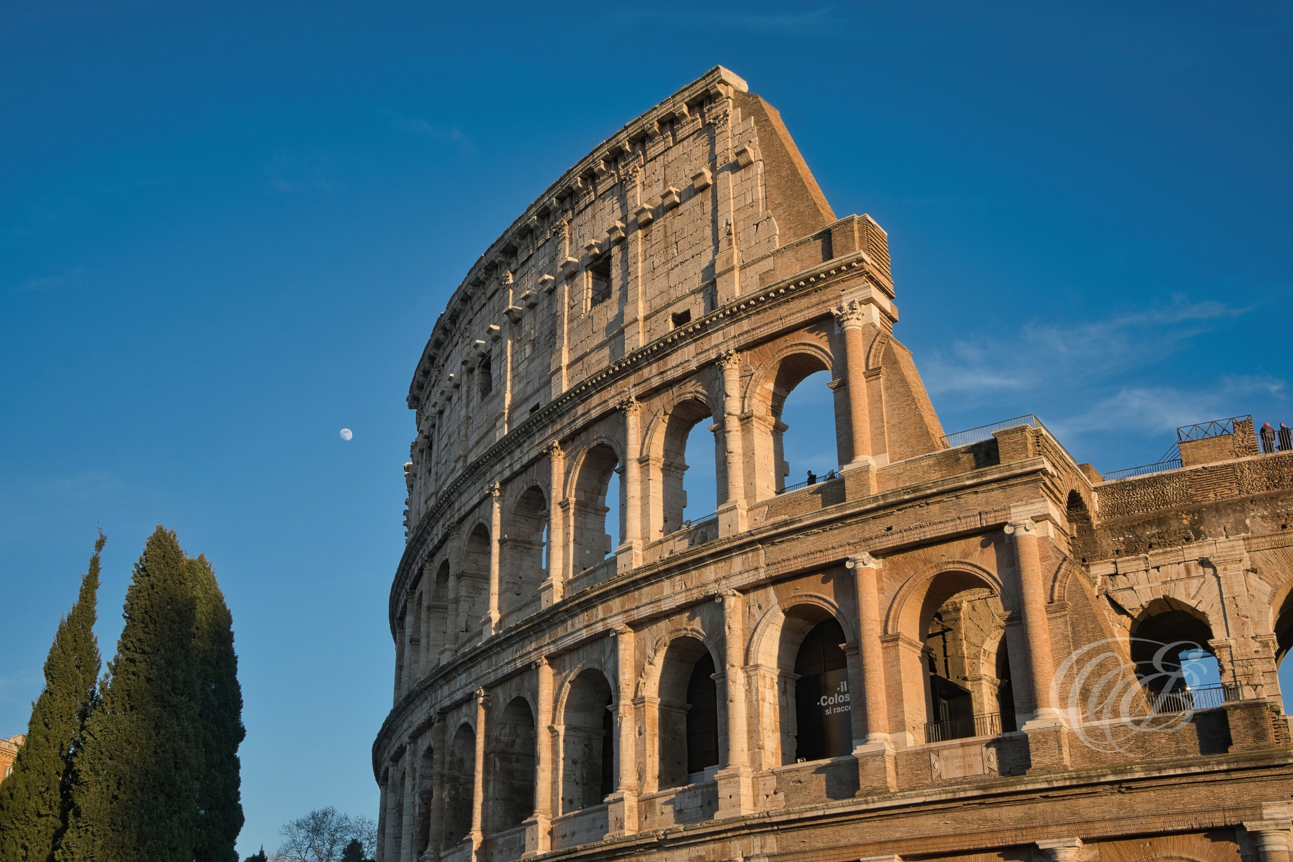 ITALY PHOTOGRAPHY — The Colosseum at Golden Hour — The Colosseum illuminated during golden hour, one of the most recognizable landmarks of Rome and a symbol of the city's enduring historical legacy, Rome, Italy — Eduardo Bartoli Photography.