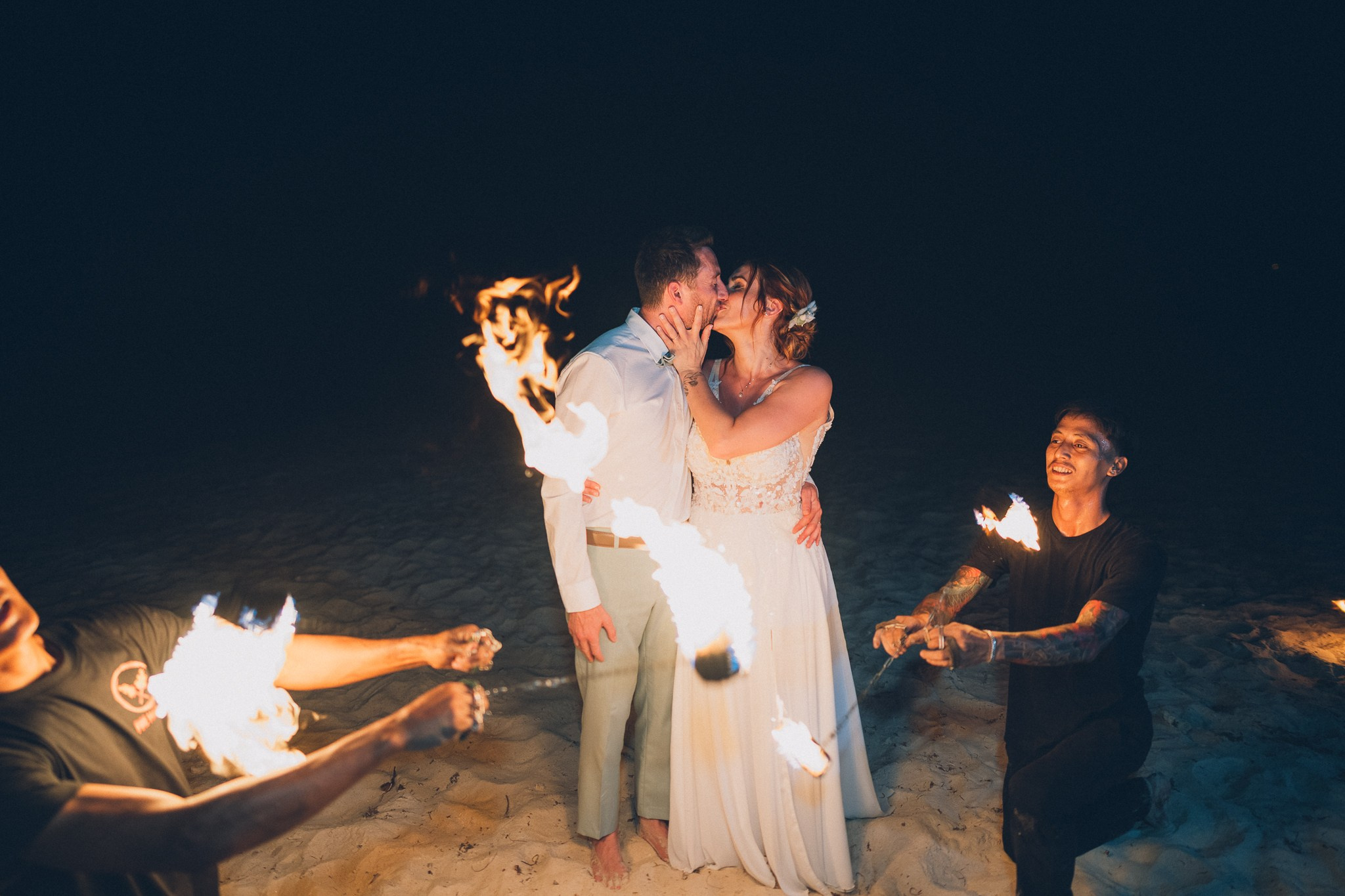 Professional fire dancers performing at a luxury wedding in Thailand