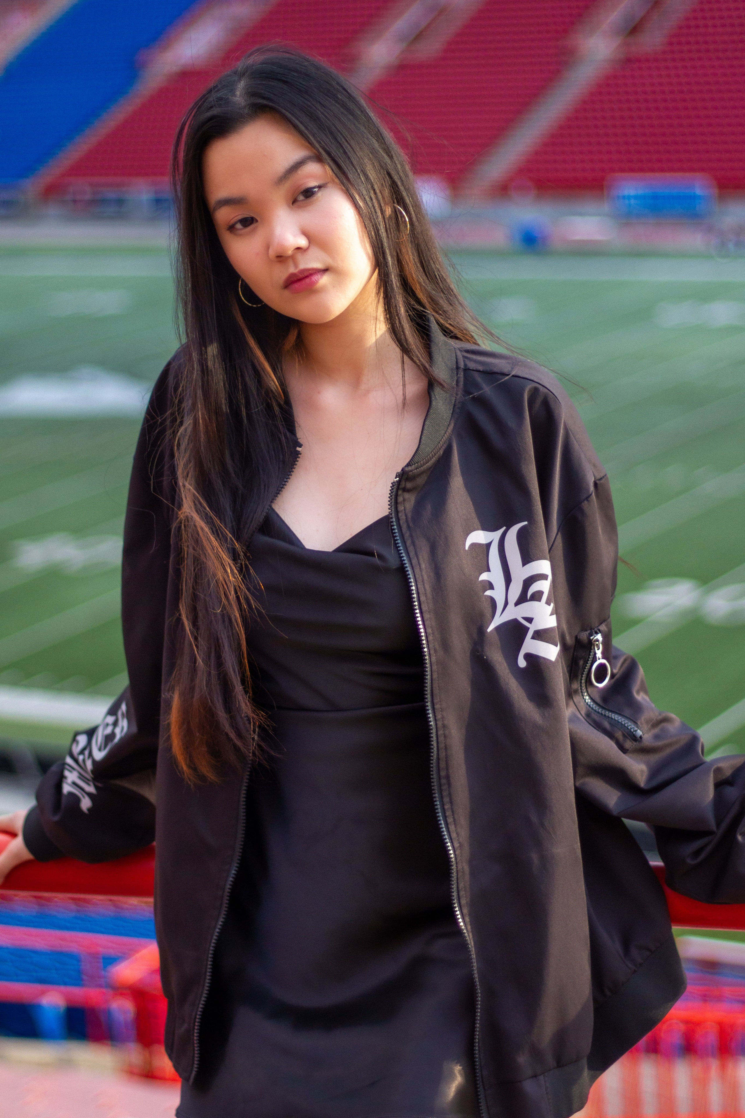 Model Ann at McMahon Stadium: A Stunning Photoshoot Under the Stadium Lights. ProFly Media Inc. — Cinematic photo and video production for brands, businesses, and spaces in Calgary