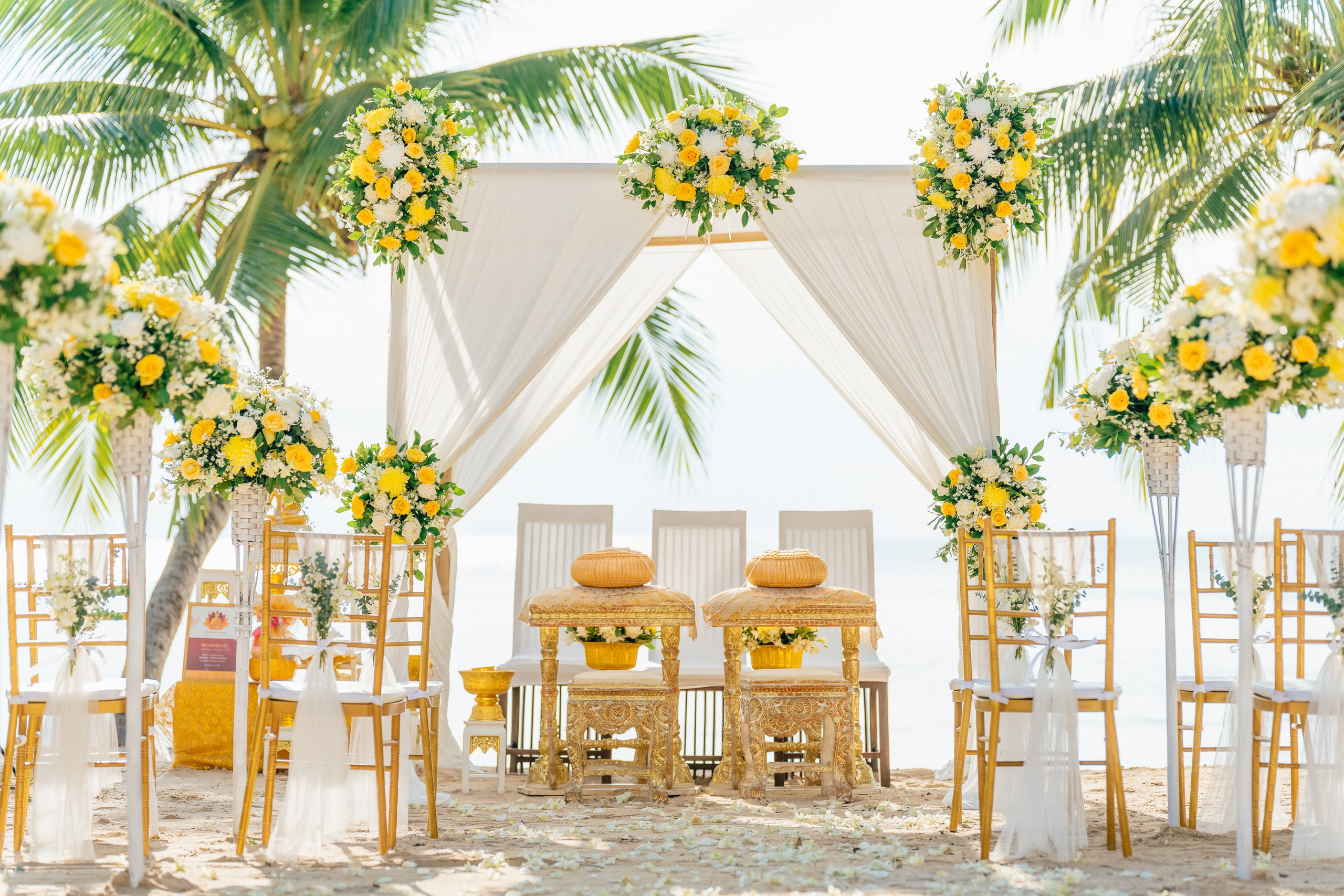Romantic Buddhist wedding ceremony with guests in Koh Samui, Thailand