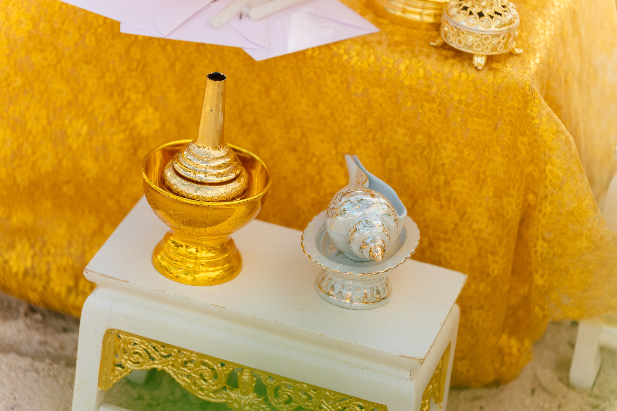 Couple celebrating a spiritual Buddhist wedding ceremony on Koh Samui
