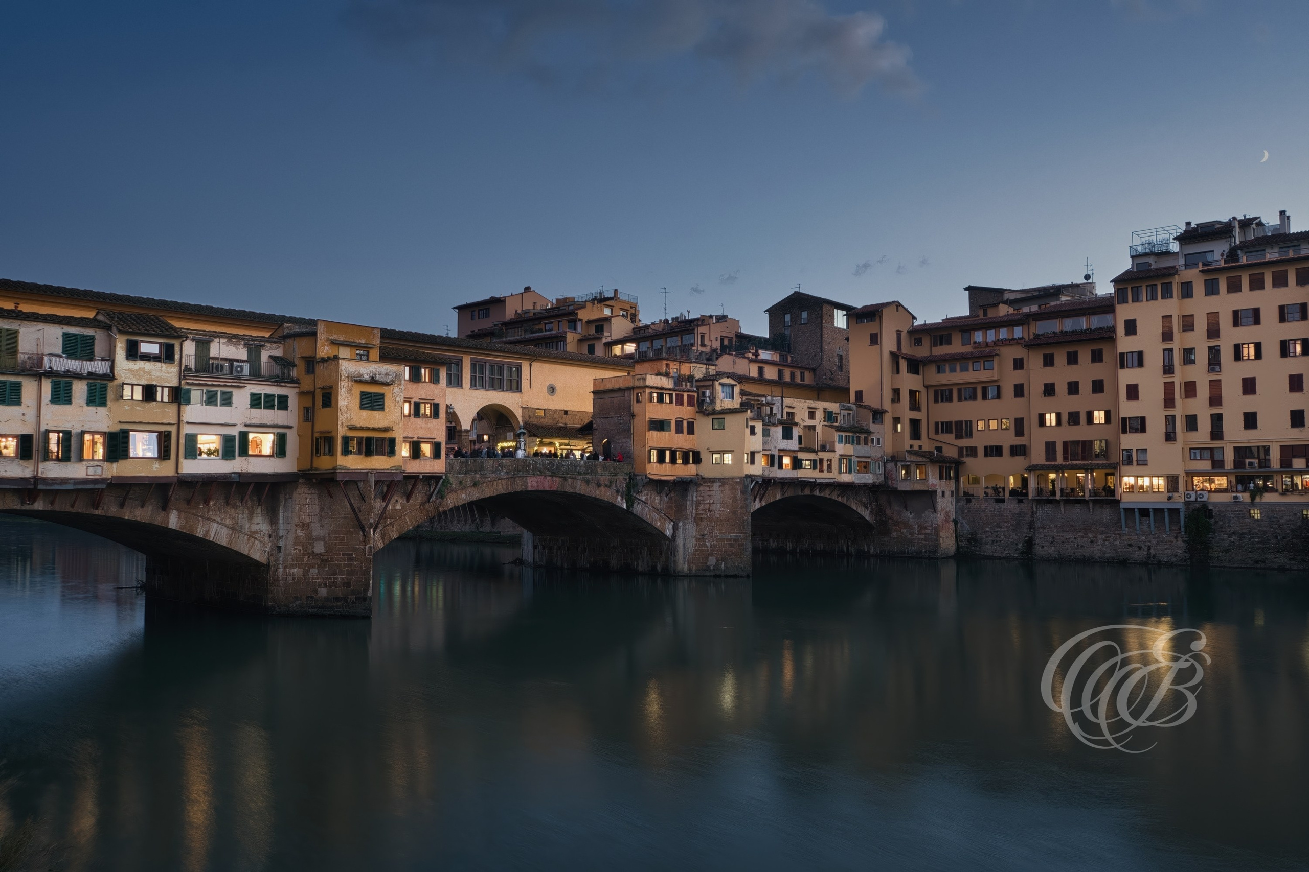 Florence, Italy—Sunset View of Ponte Vecchio—Eduardo Bartoli Photography—Photograph of Ponte Vecchio at sunset in Florence, Italy, historic medieval bridge spanning the Arno River and part of the city’s UNESCO-listed center—Florence, Italy—Sunset View of Ponte Vecchio—Eduardo Bartoli Photography.