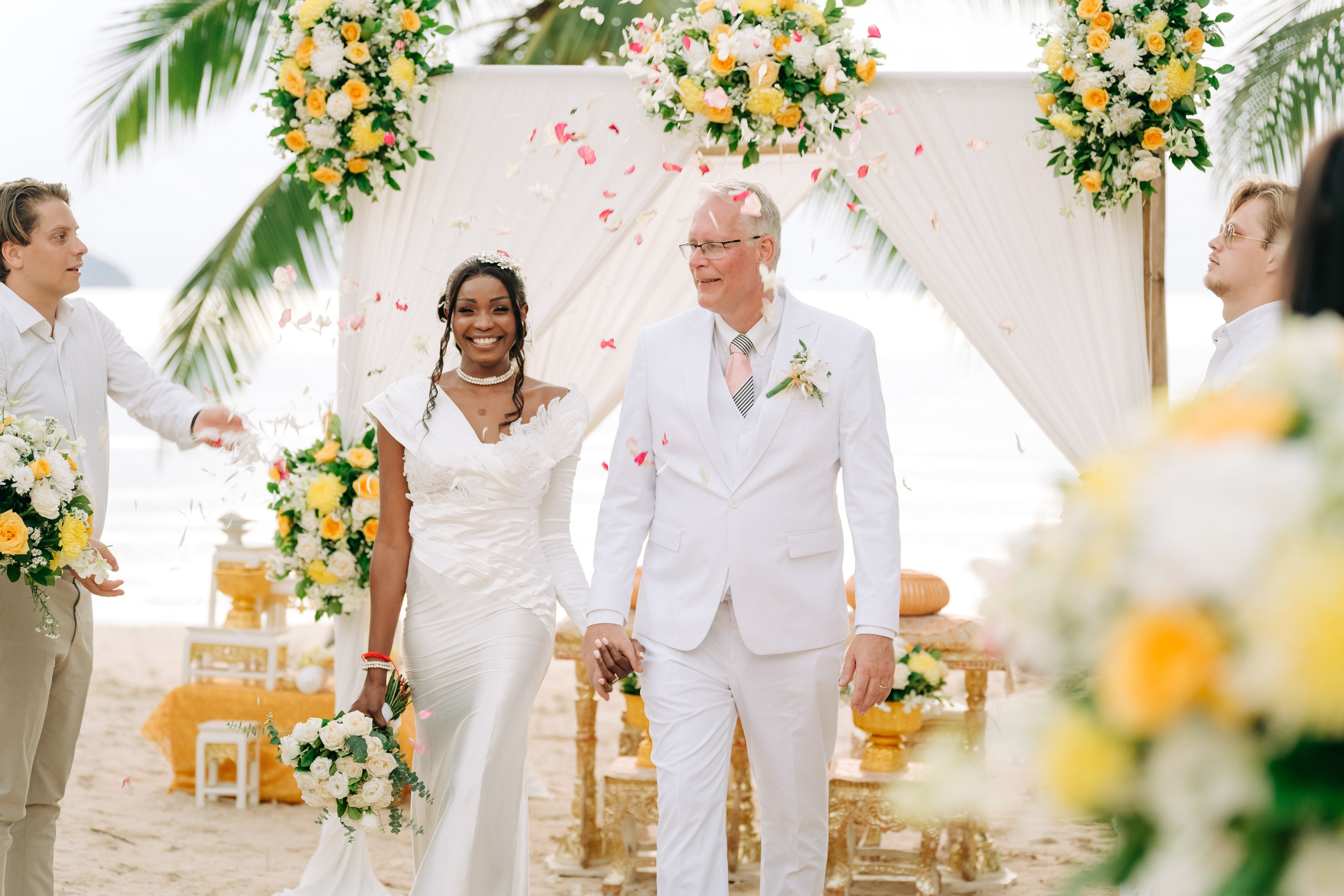 Romantic Buddhist wedding ceremony with guests in Koh Samui, Thailand