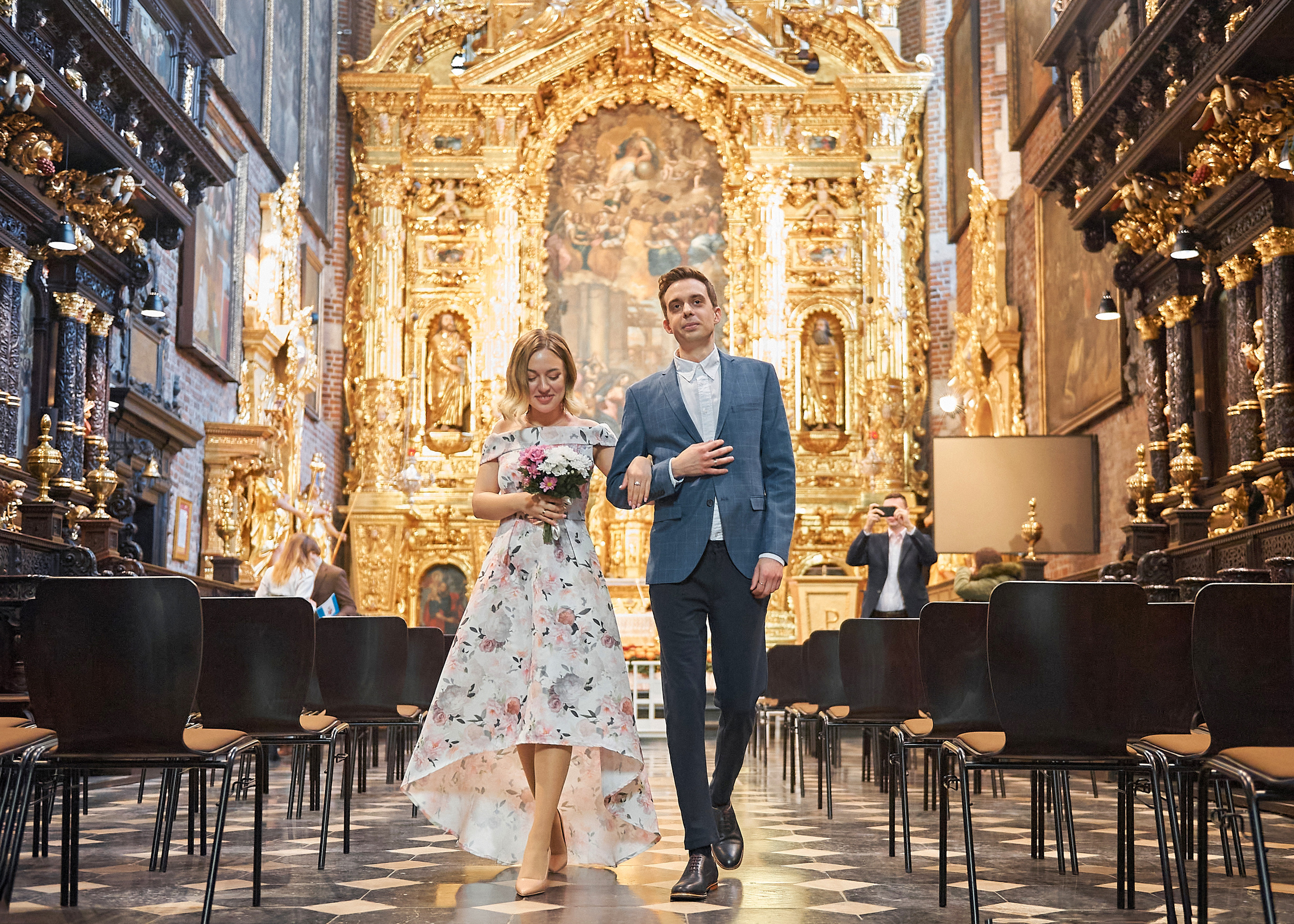 Wedding in the church. Wedding photography and videography team