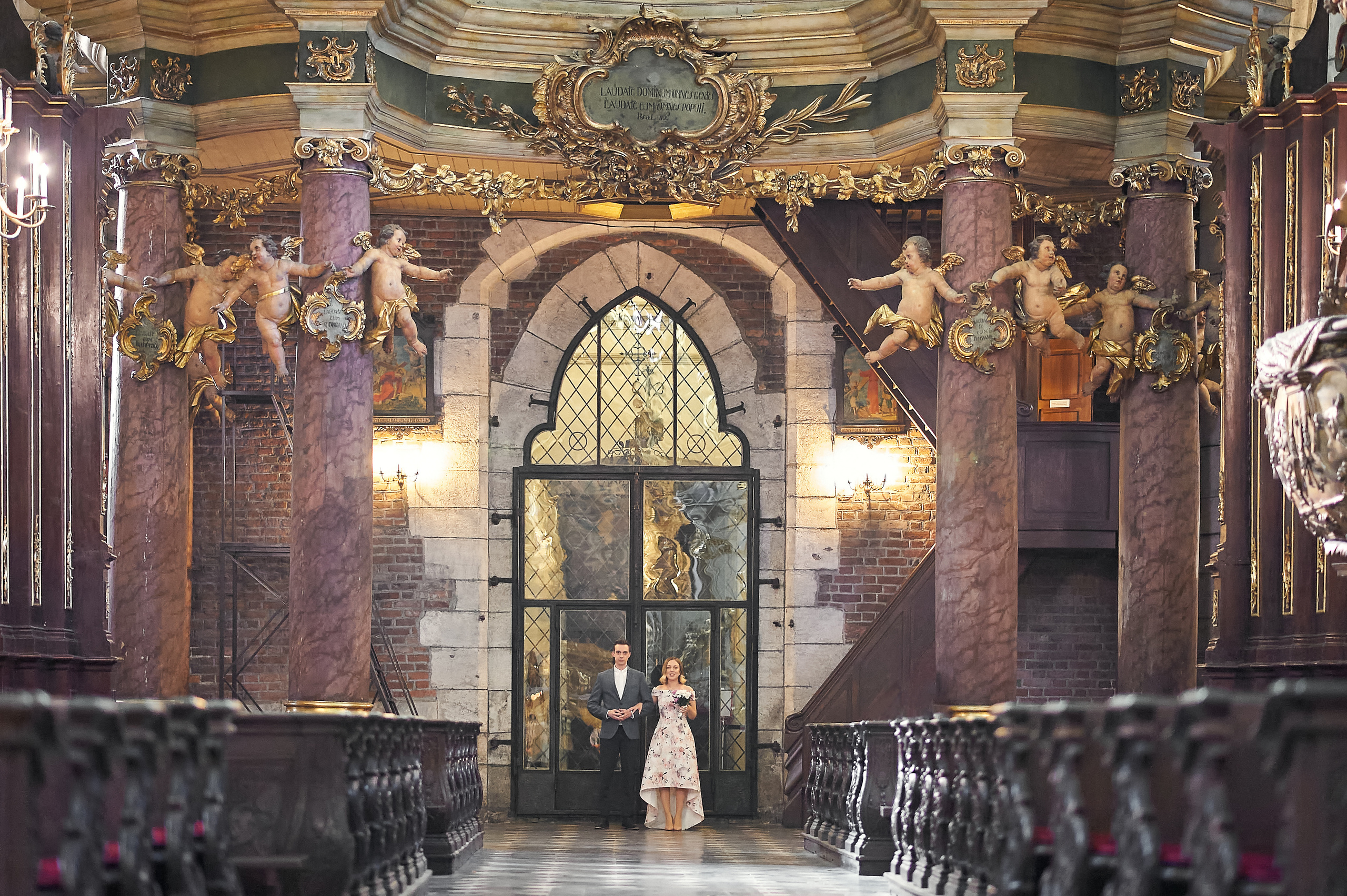 Wedding in the church. Wedding photography and videography team