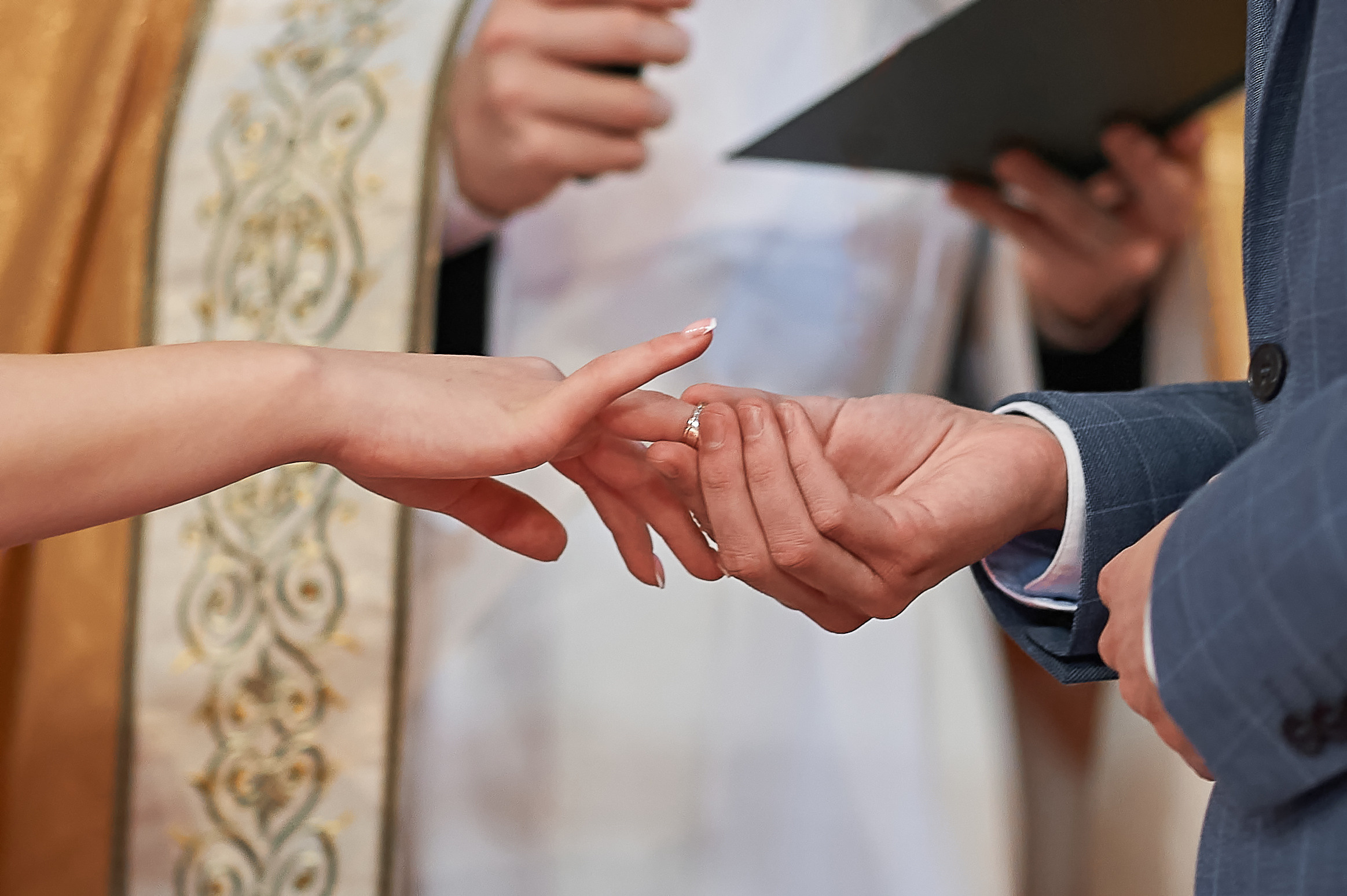 Wedding in the church. Wedding photography and videography team