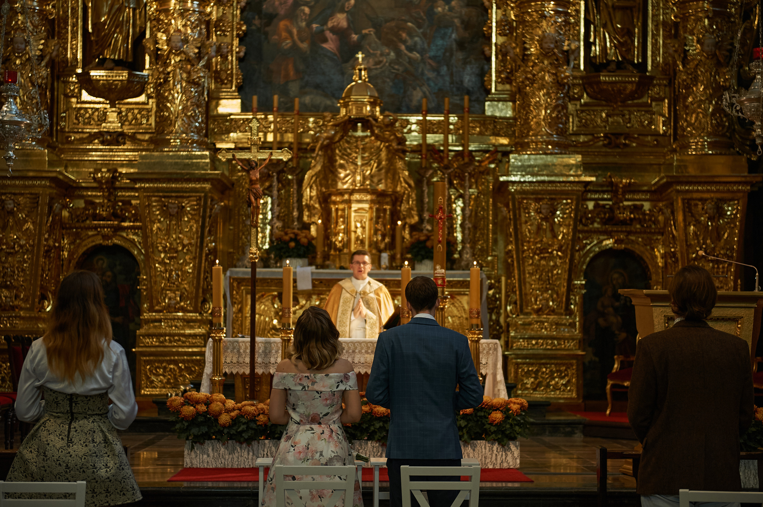 Wedding in the church. Wedding photography and videography team