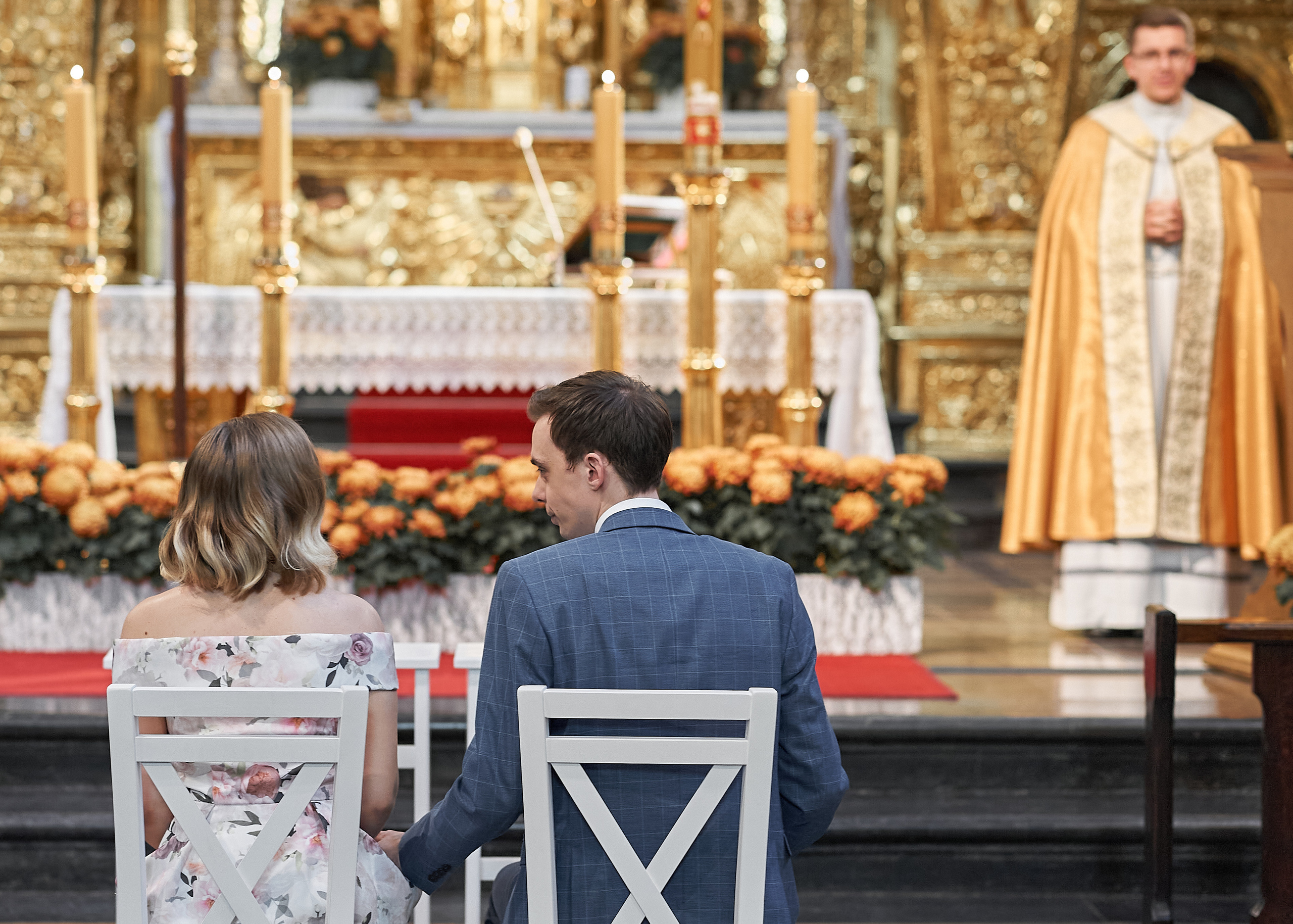 Wedding in the church. Wedding photography and videography team