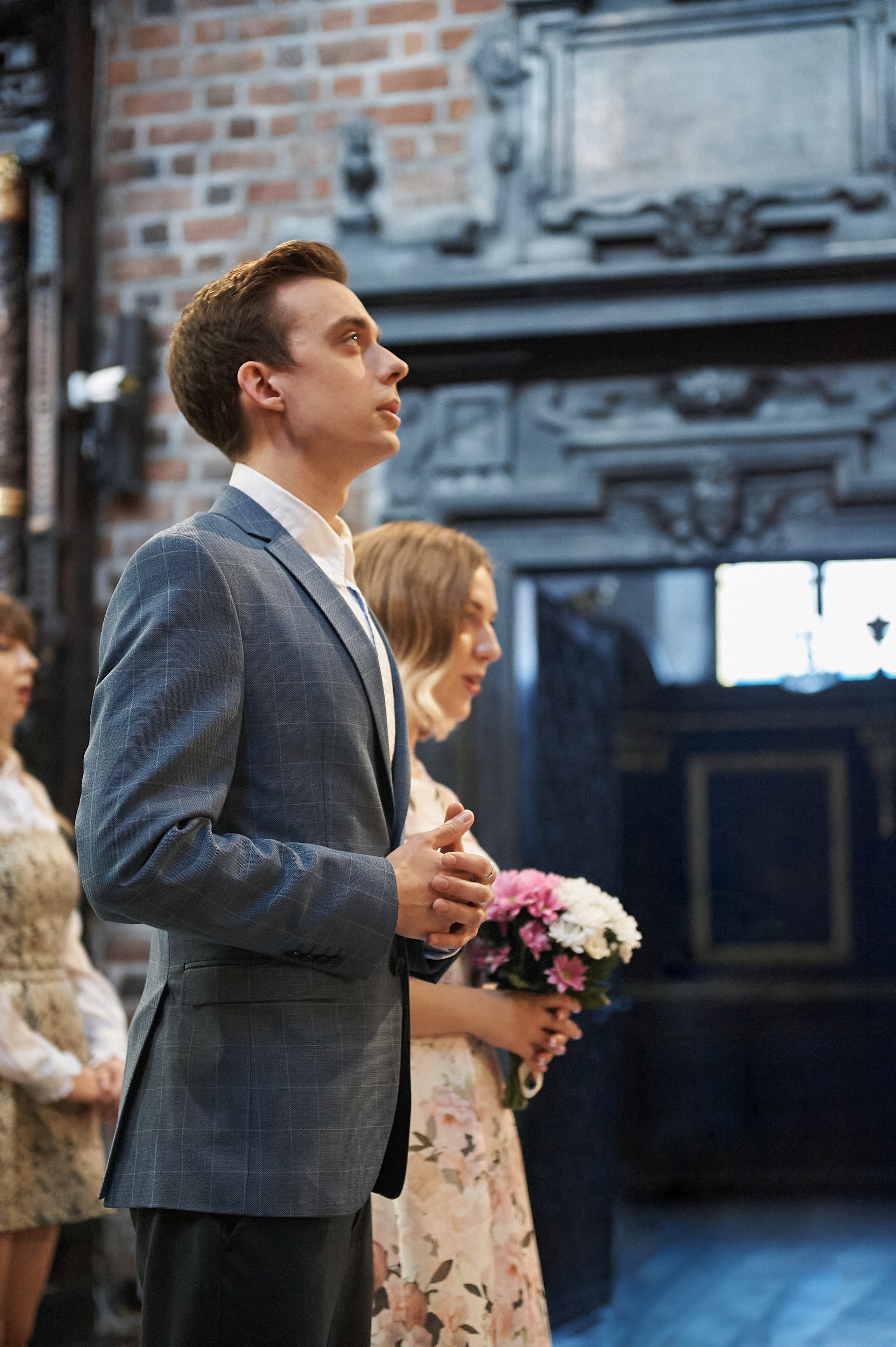 Wedding in the church. Wedding photography and videography team
