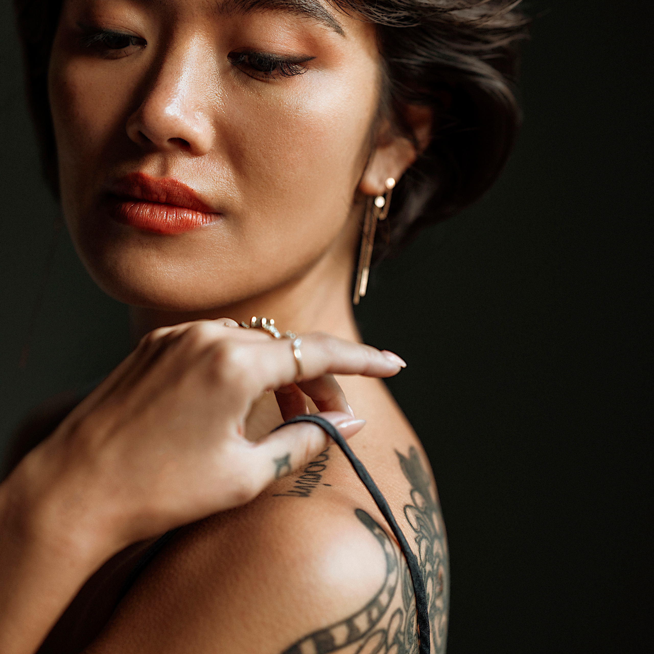 Female portrait of Asian woman with shoulder tattoo - portrait photography session Mexico City