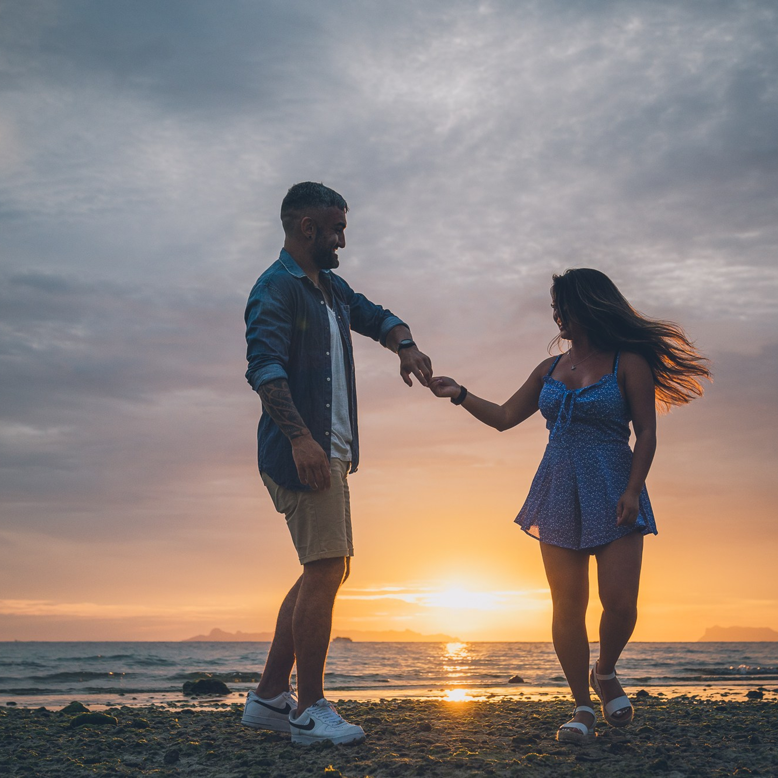 Luxury beach proposal in Koh Samui, Thailand. Private sunset setup with candles, flowers, and ocean view for an unforgettable engagement experience.