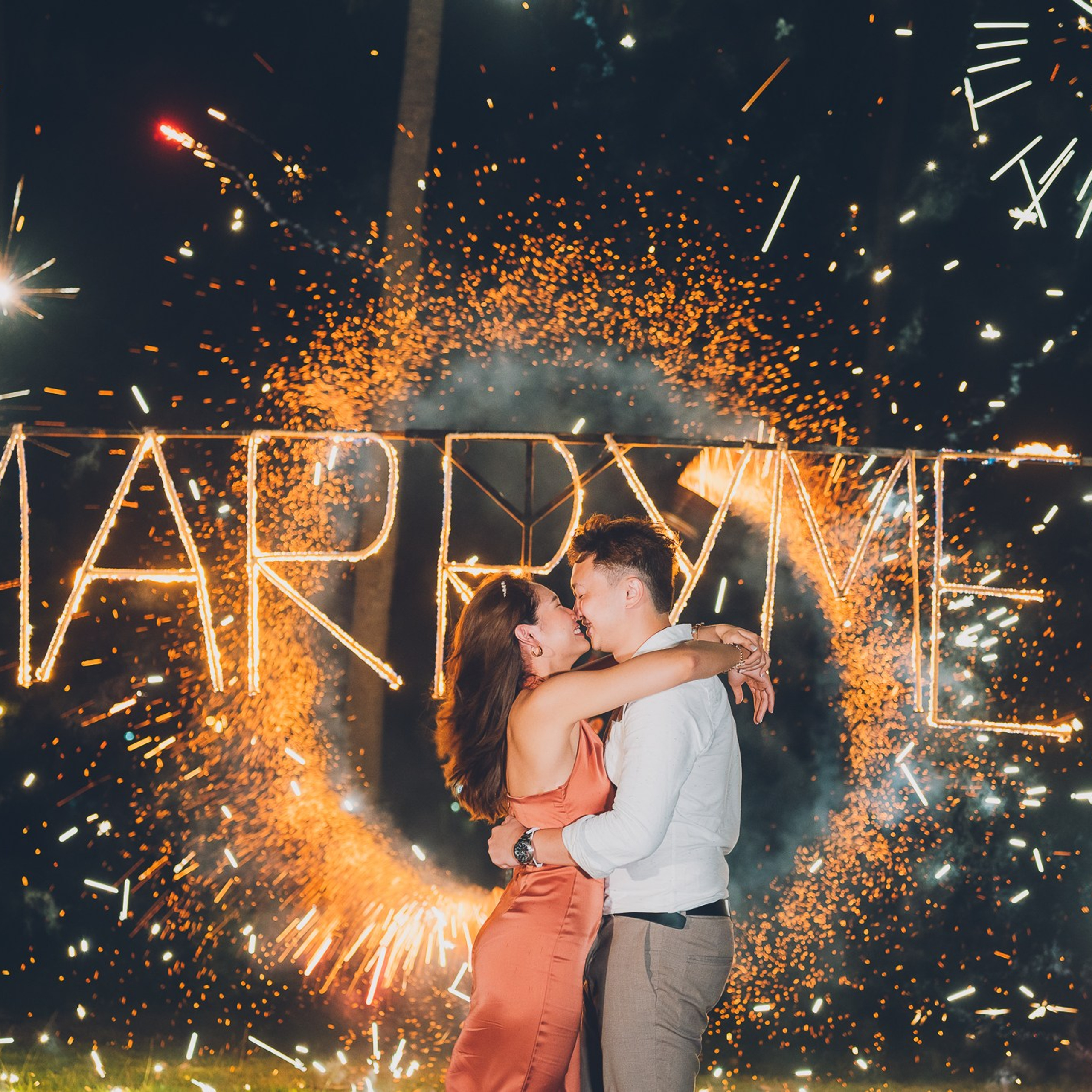 Luxury beach proposal in Koh Samui, Thailand. Private sunset setup with candles, flowers, and ocean view for an unforgettable engagement experience.