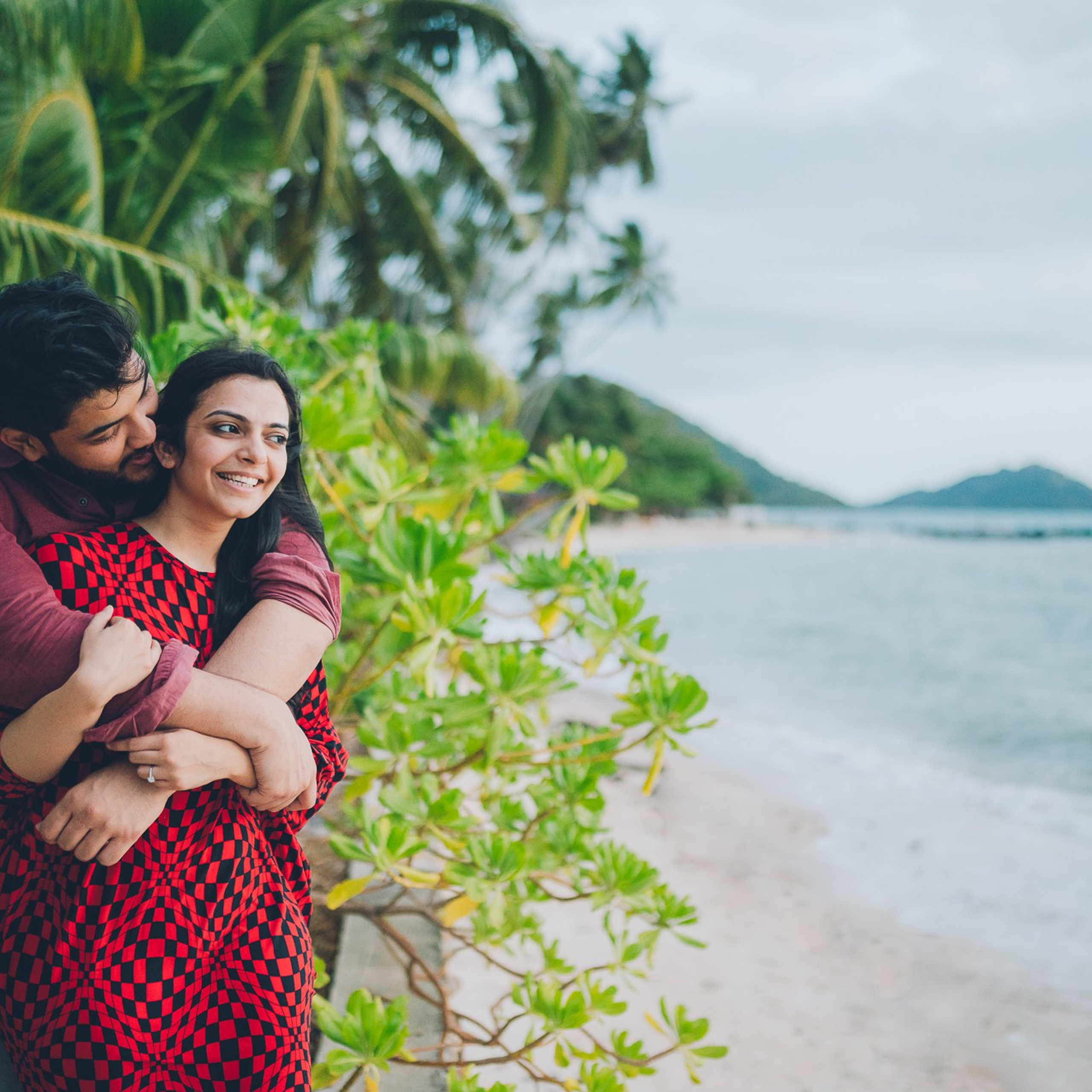 Luxury beach proposal in Koh Samui, Thailand. Private sunset setup with candles, flowers, and ocean view for an unforgettable engagement experience.