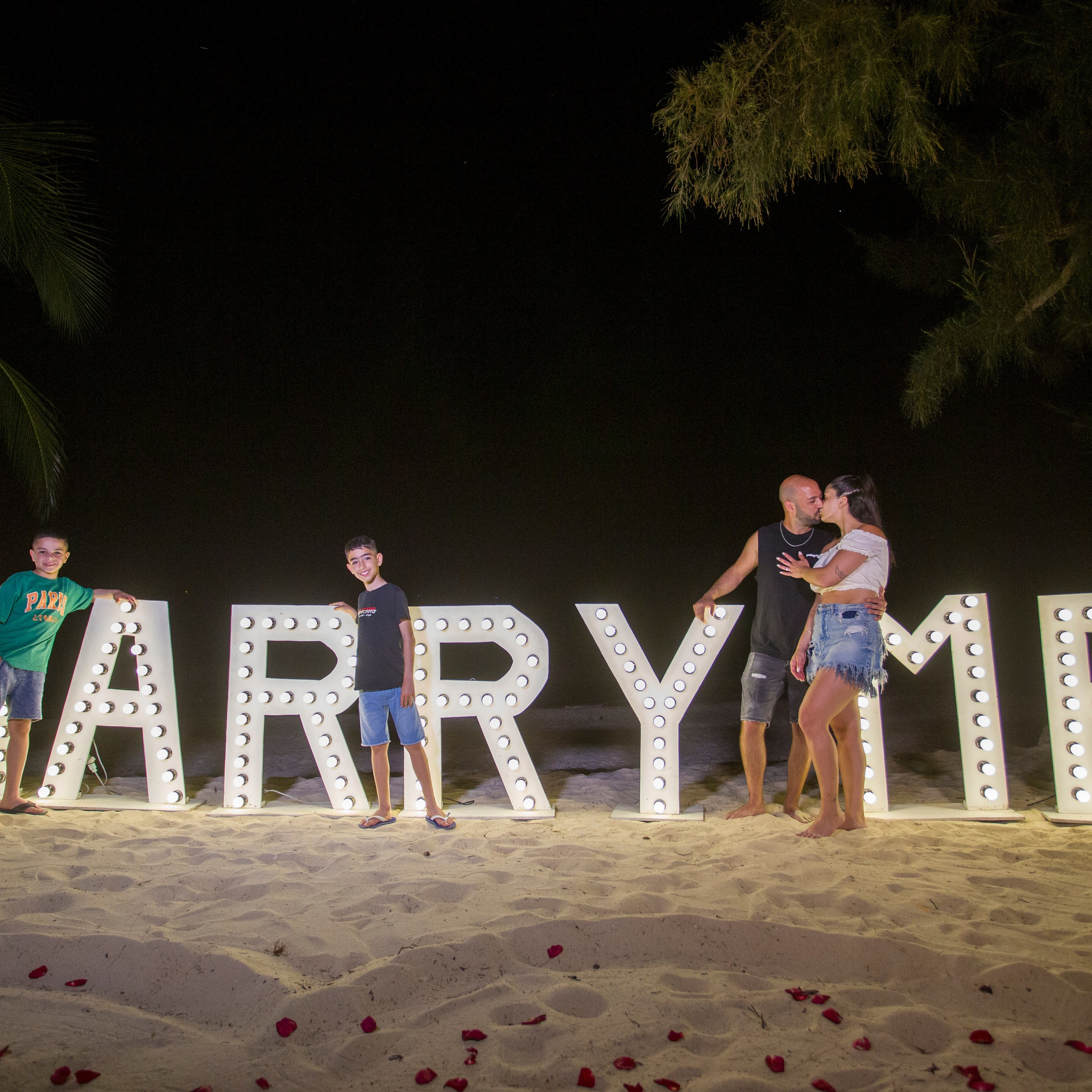 Luxury beach proposal in Koh Samui, Thailand. Private sunset setup with candles, flowers, and ocean view for an unforgettable engagement experience.
