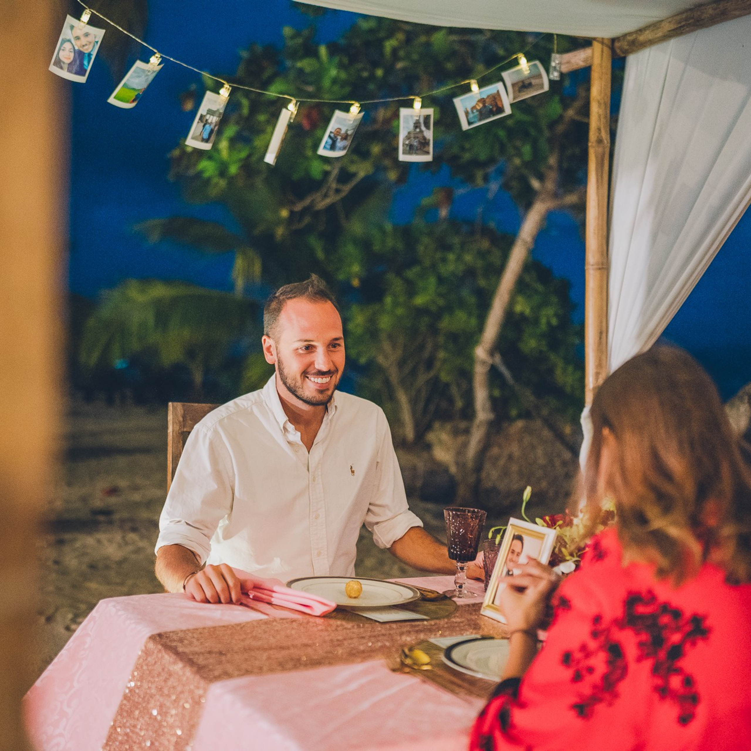 Luxury beach proposal in Koh Samui, Thailand. Private sunset setup with candles, flowers, and ocean view for an unforgettable engagement experience.