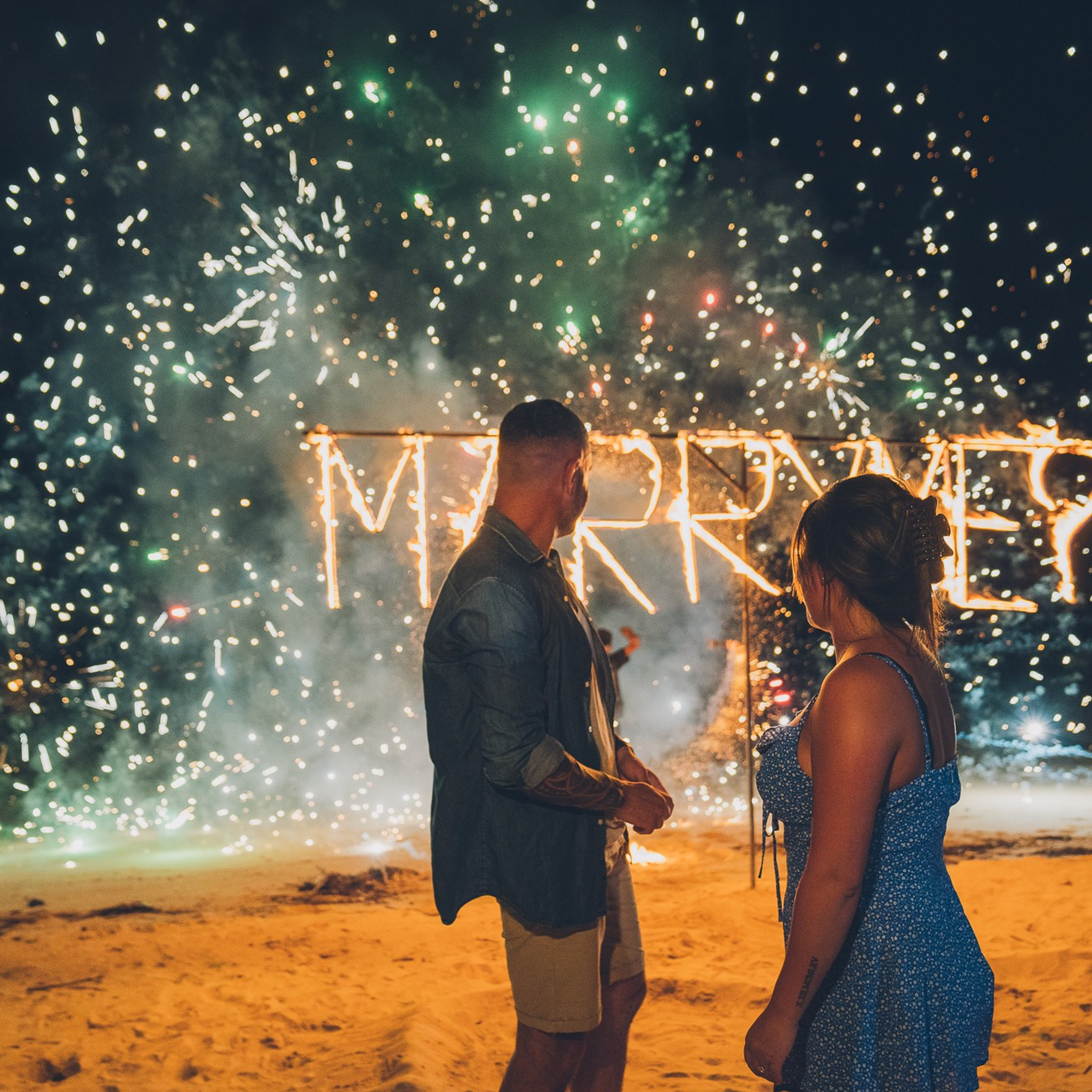 Luxury beach proposal in Koh Samui, Thailand. Private sunset setup with candles, flowers, and ocean view for an unforgettable engagement experience.