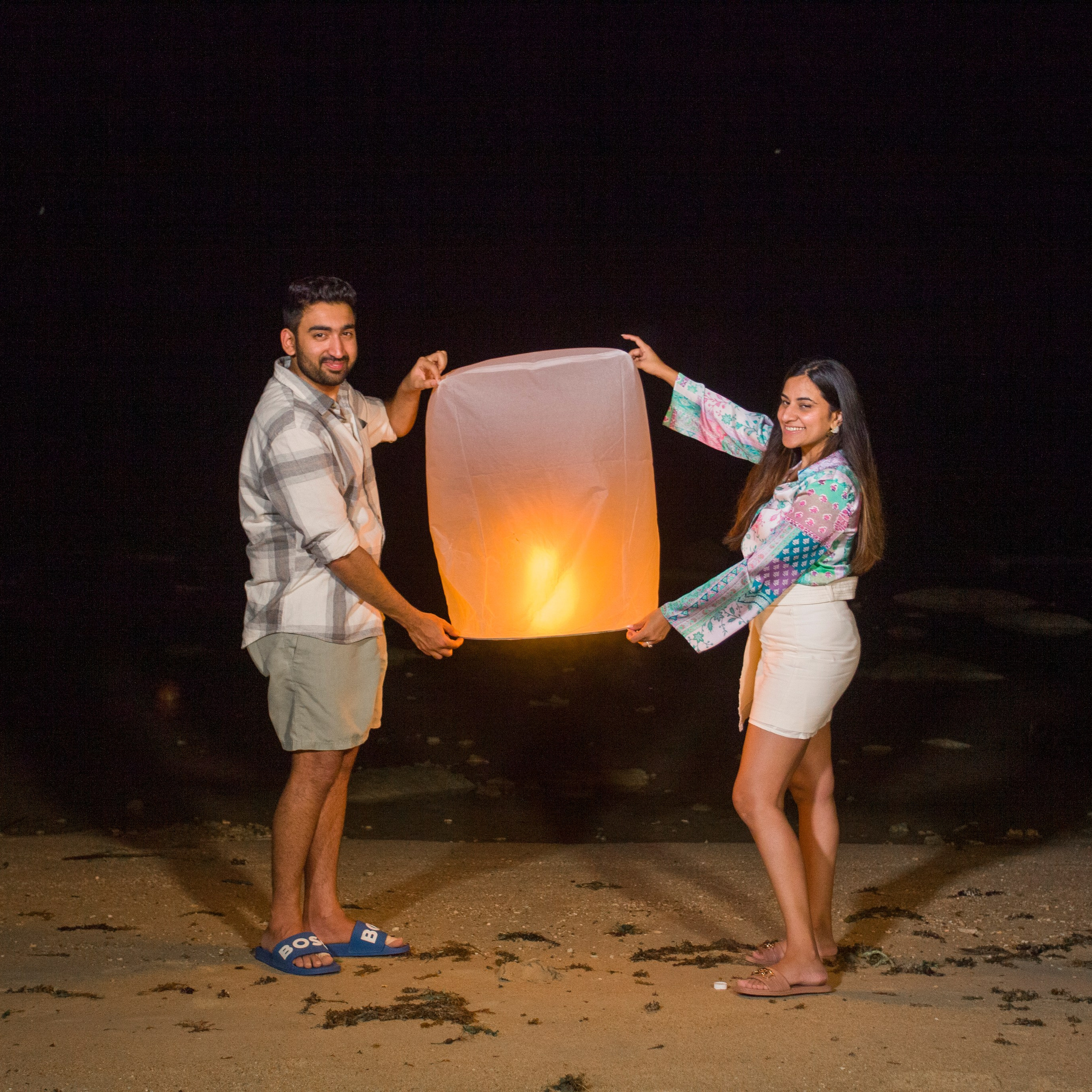 Luxury beach proposal in Koh Samui, Thailand. Private sunset setup with candles, flowers, and ocean view for an unforgettable engagement experience.