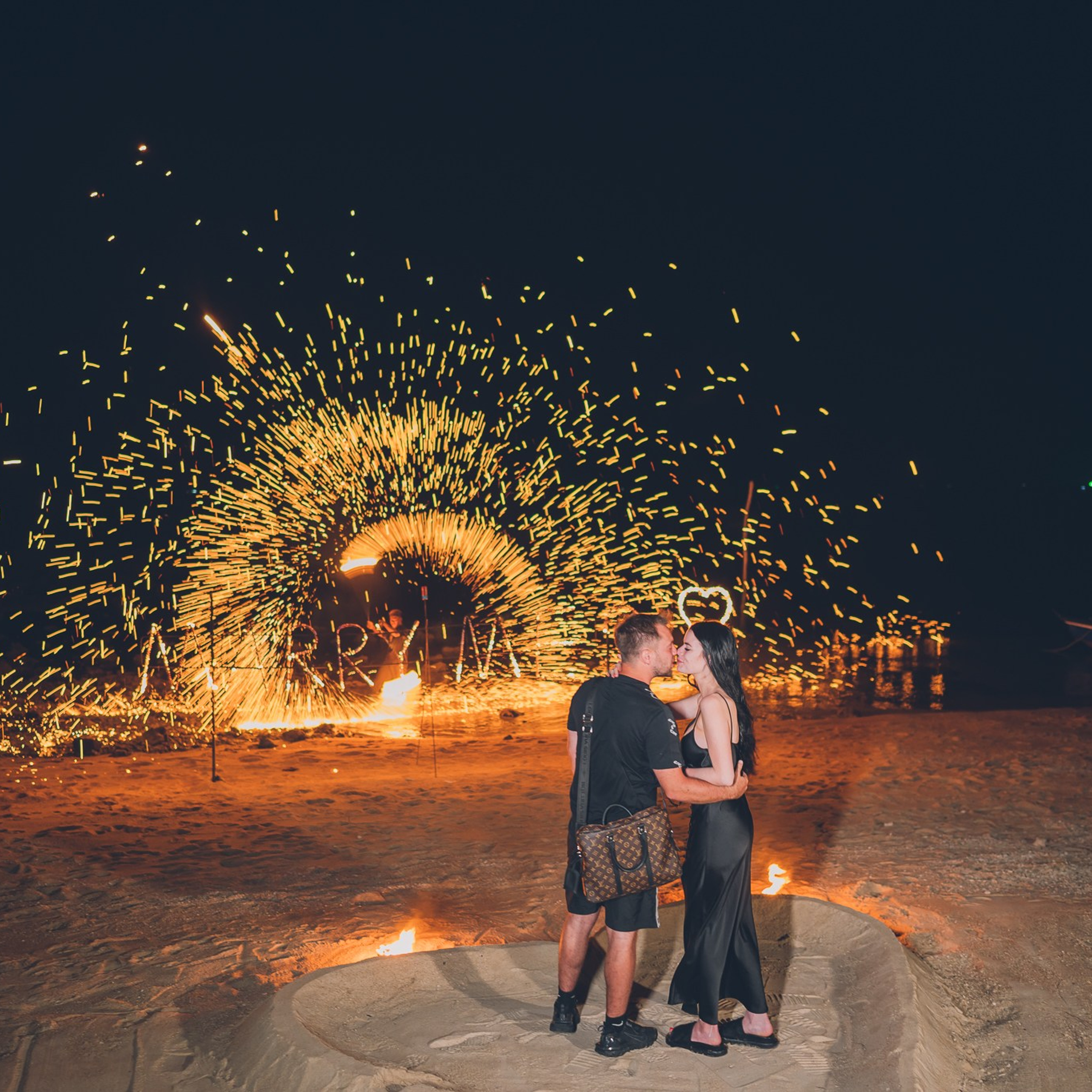 Luxury beach proposal in Koh Samui, Thailand. Private sunset setup with candles, flowers, and ocean view for an unforgettable engagement experience.