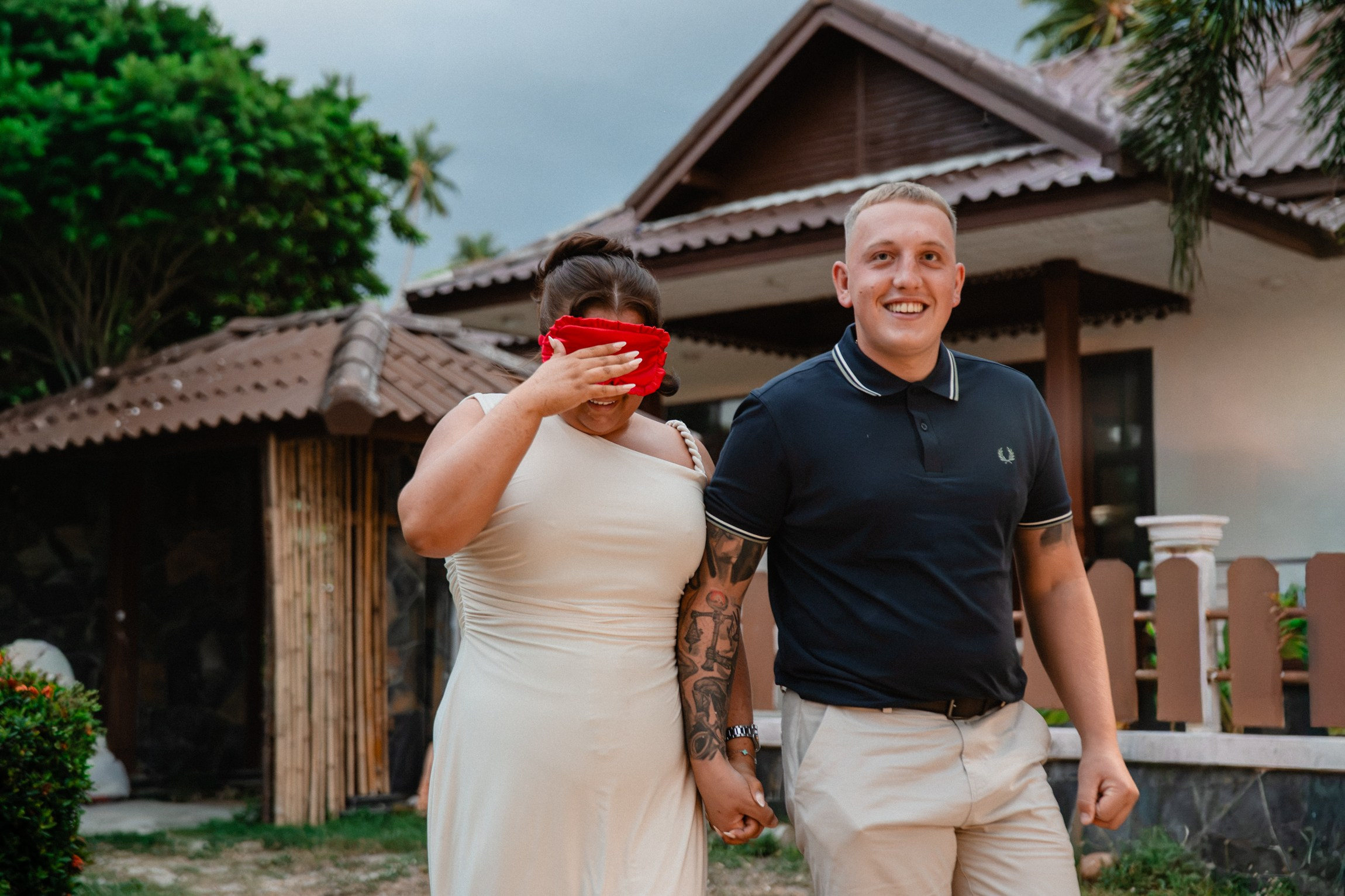 Surprise marriage proposal in Koh Samui with a blindfolded woman being led to the romantic proposal setup by her partner.