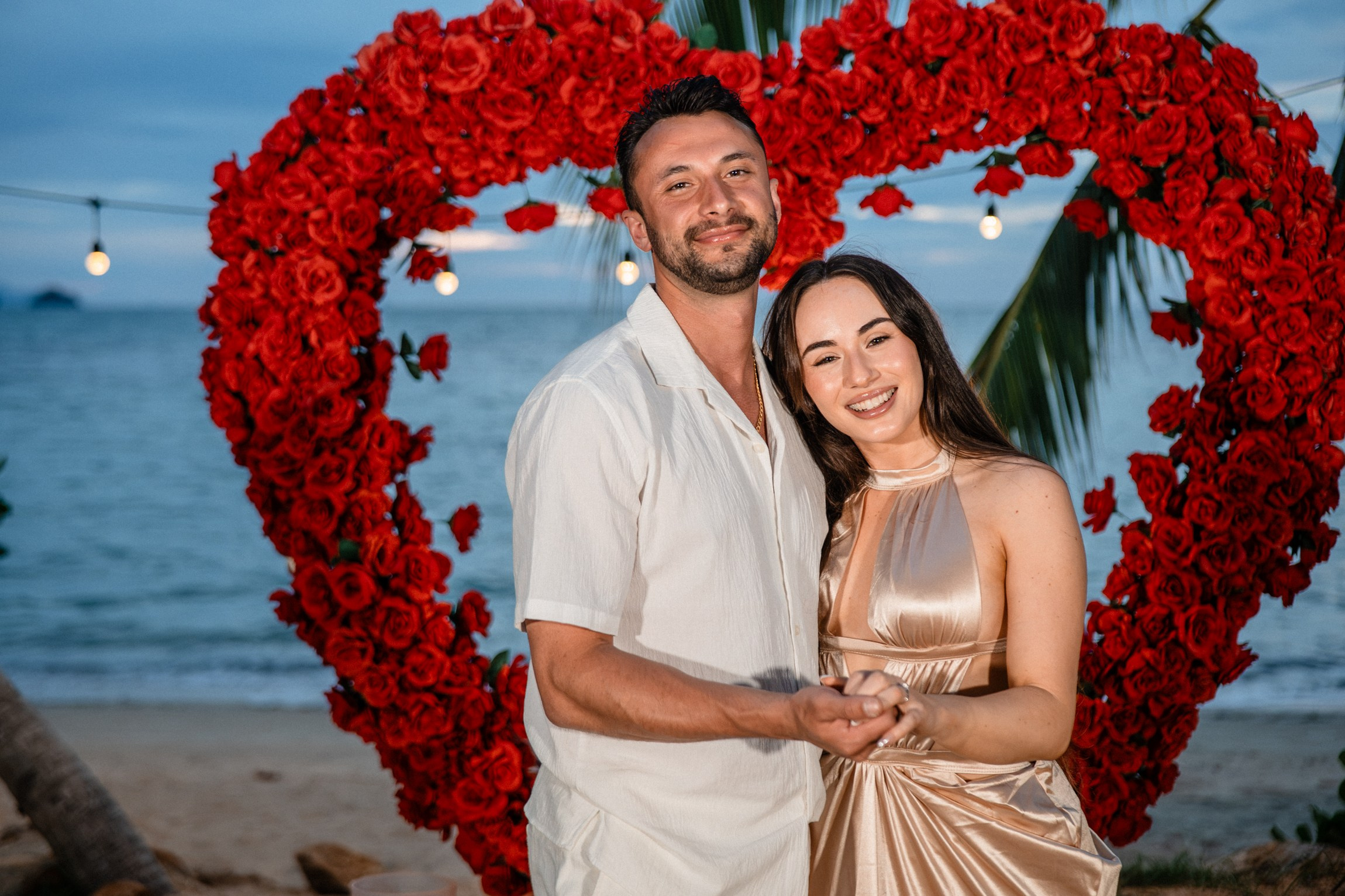 Romantic dinner and proposal setup on Koh Samui beach for couples celebrating engagement.