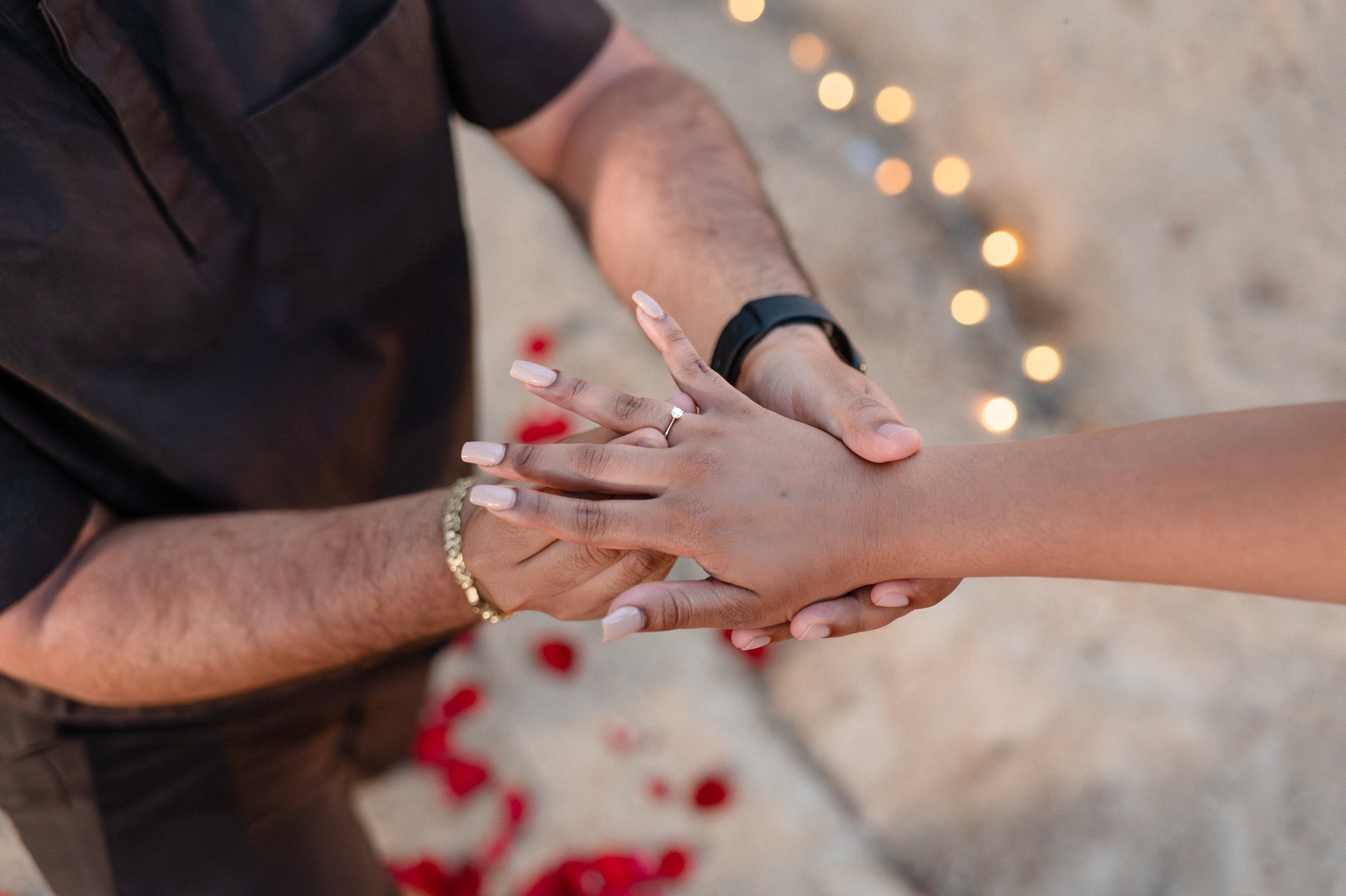 Close-up of a newly engaged woman’s hand with her engagement ring after a romantic proposal in Pattaya.