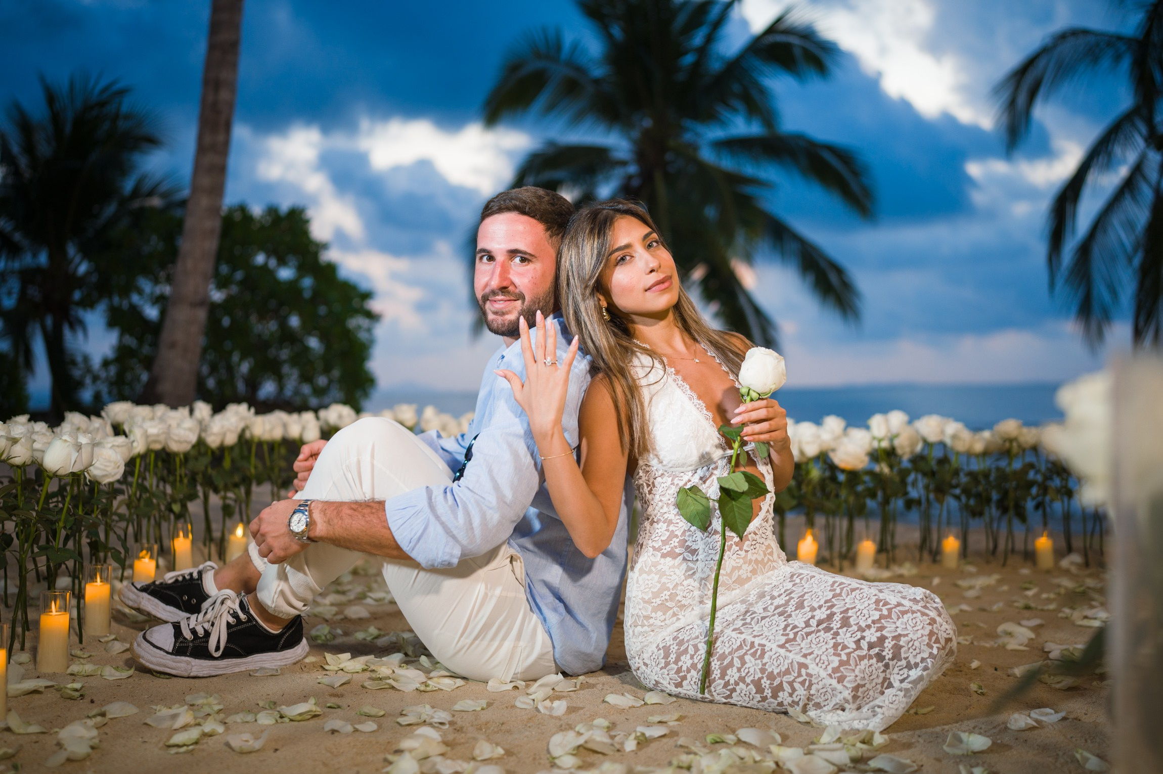 Romantic dinner and proposal setup on Koh Samui beach for couples celebrating engagement.