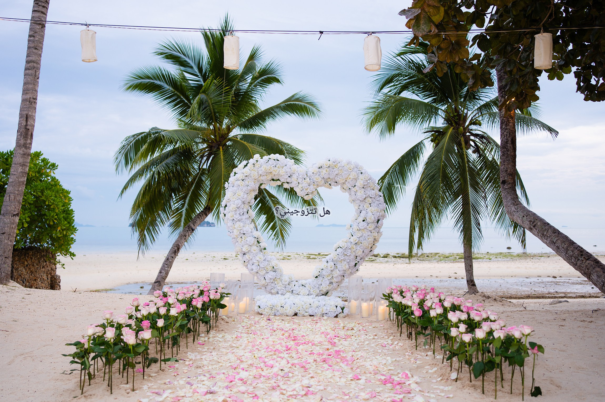 Luxury proposal planner in Koh Samui creating unforgettable romantic beach experiences.