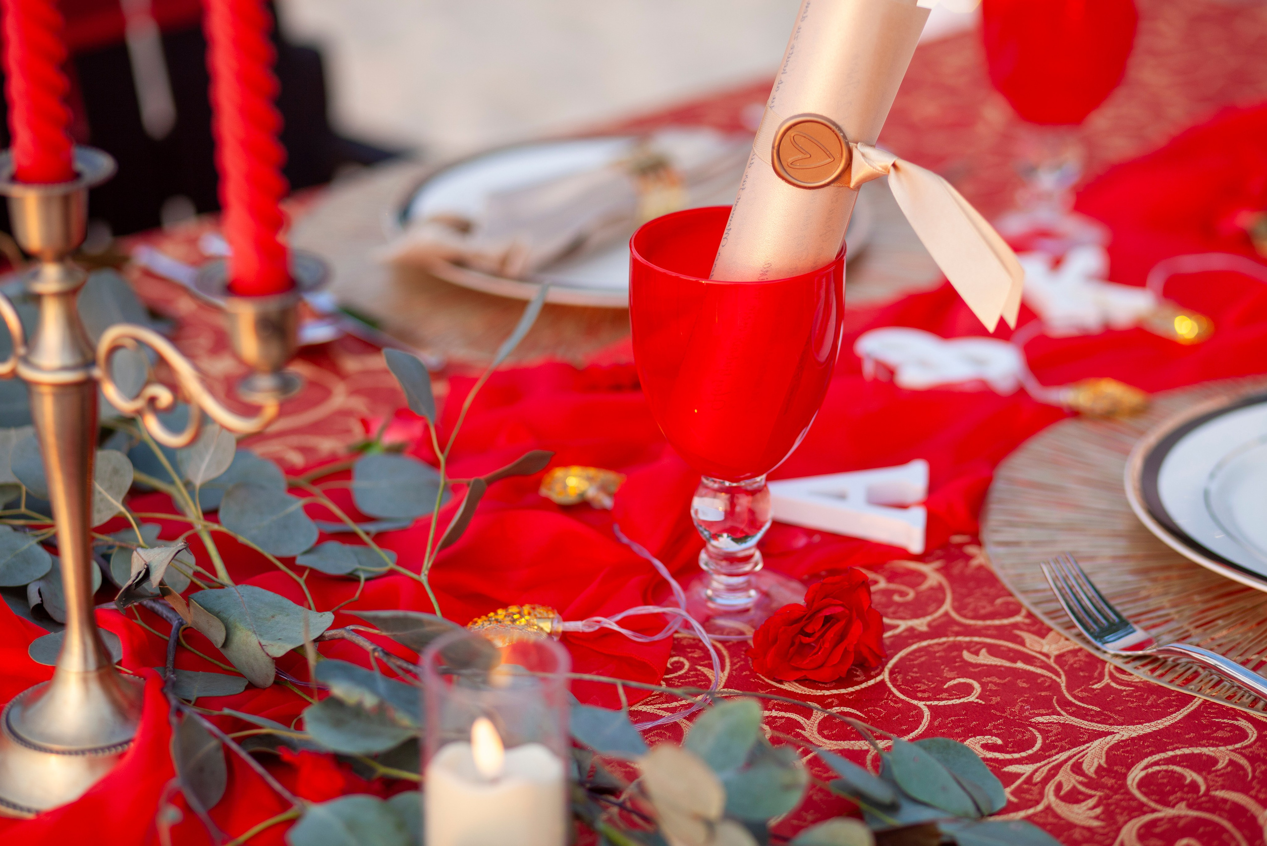 Elegant “Marry Me” beach proposal setup in Koh Samui with rose petals and tropical decor.