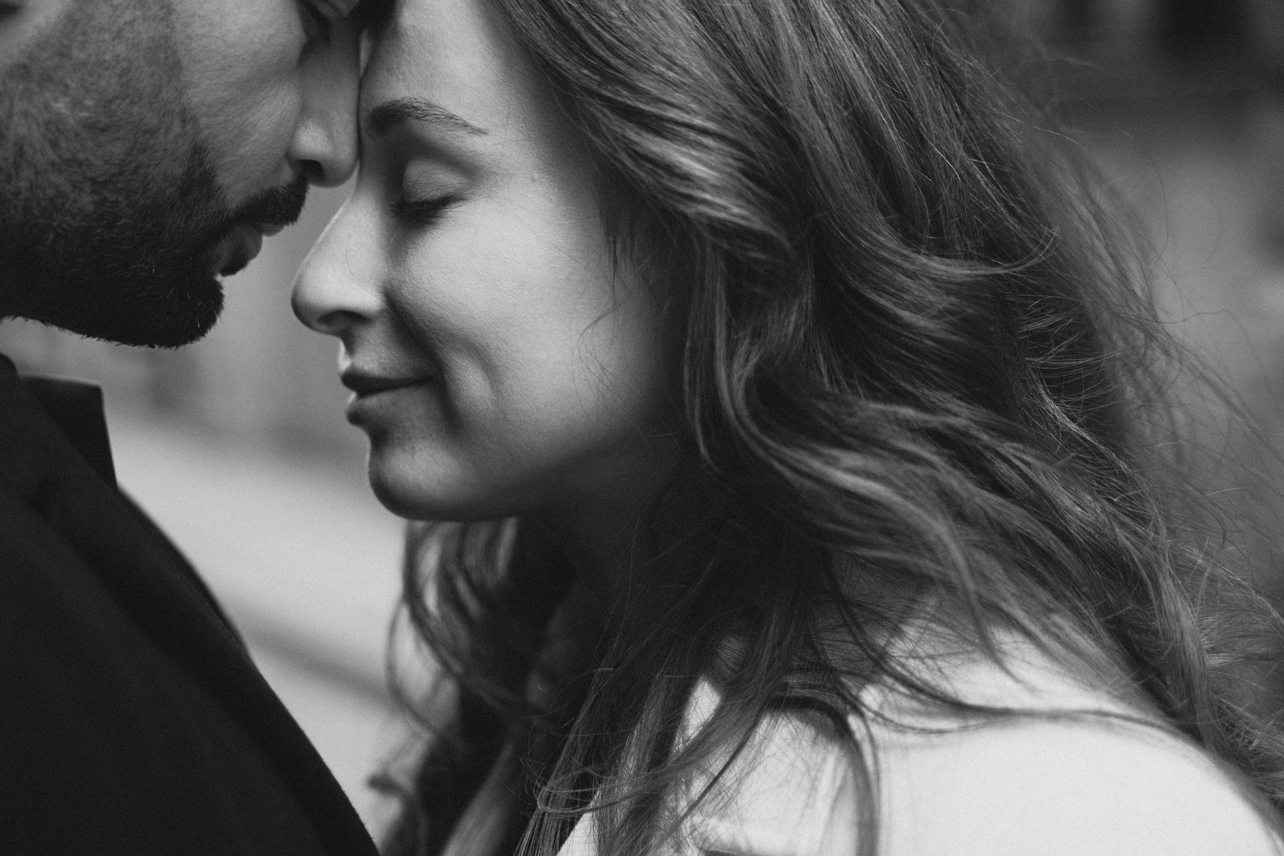 Couple embracing during a cinematic love story session in Montreal