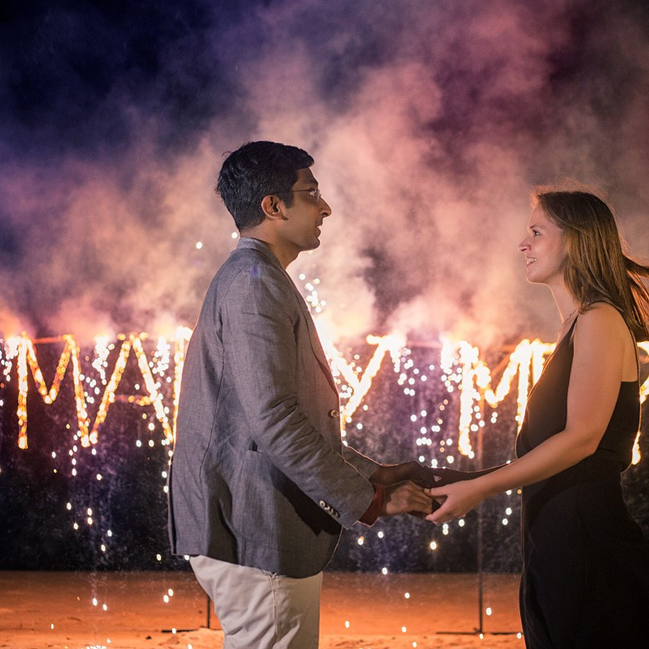Luxury beach proposal in Koh Samui, Thailand. Private sunset setup with candles, flowers, and ocean view for an unforgettable engagement experience.
