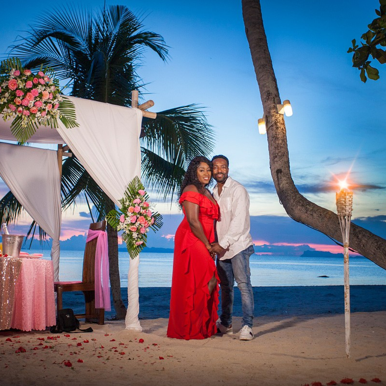 Luxury beach proposal in Koh Samui, Thailand. Private sunset setup with candles, flowers, and ocean view for an unforgettable engagement experience.