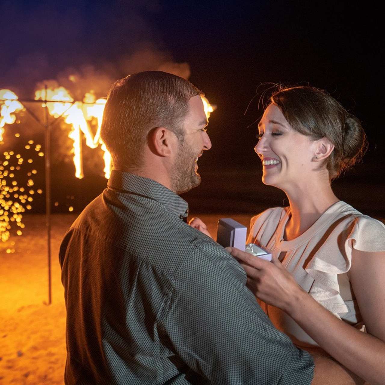 Luxury beach proposal in Koh Samui, Thailand. Private sunset setup with candles, flowers, and ocean view for an unforgettable engagement experience.