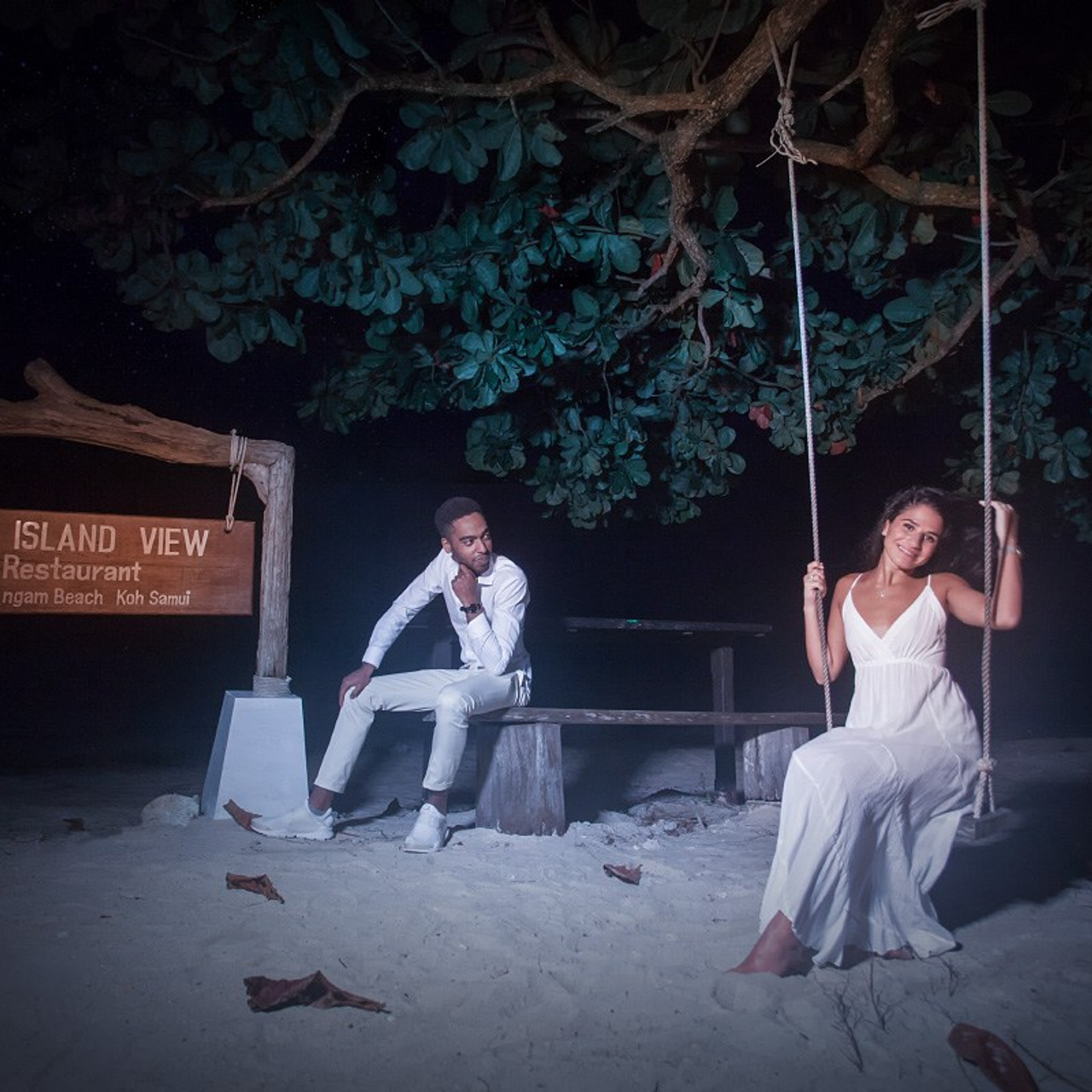 Luxury beach proposal in Koh Samui, Thailand. Private sunset setup with candles, flowers, and ocean view for an unforgettable engagement experience.