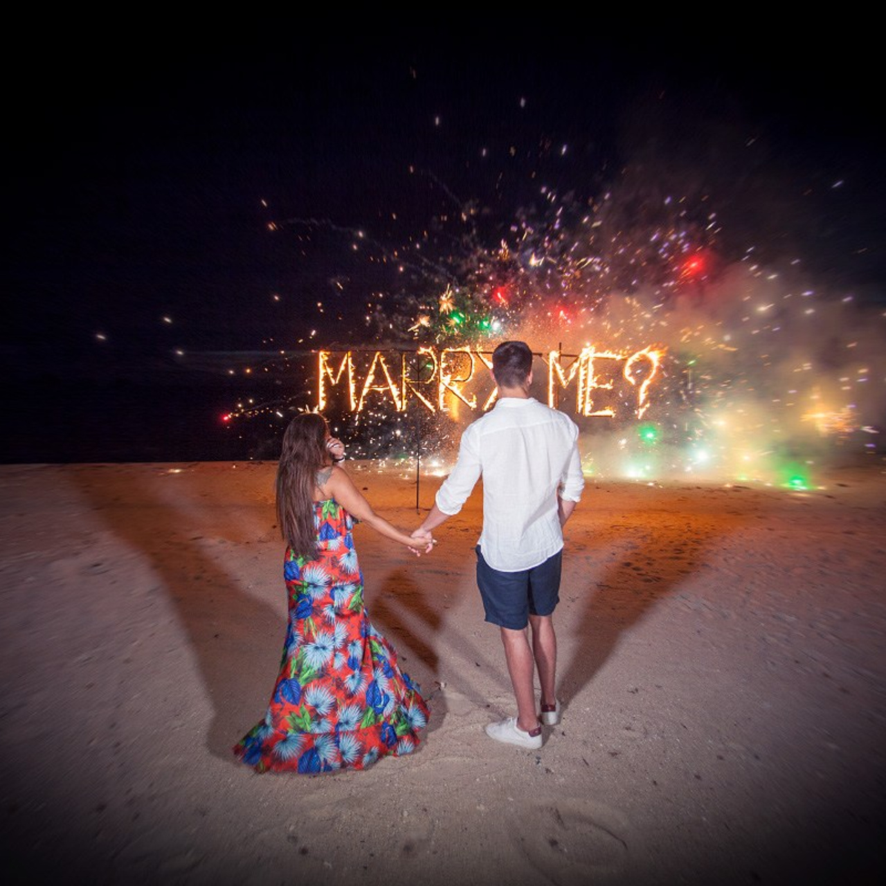 Luxury beach proposal in Koh Samui, Thailand. Private sunset setup with candles, flowers, and ocean view for an unforgettable engagement experience.