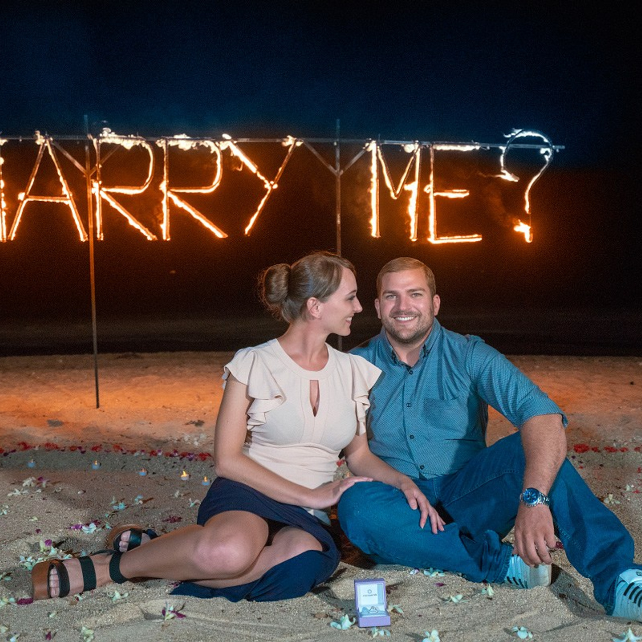Luxury beach proposal in Koh Samui, Thailand. Private sunset setup with candles, flowers, and ocean view for an unforgettable engagement experience.
