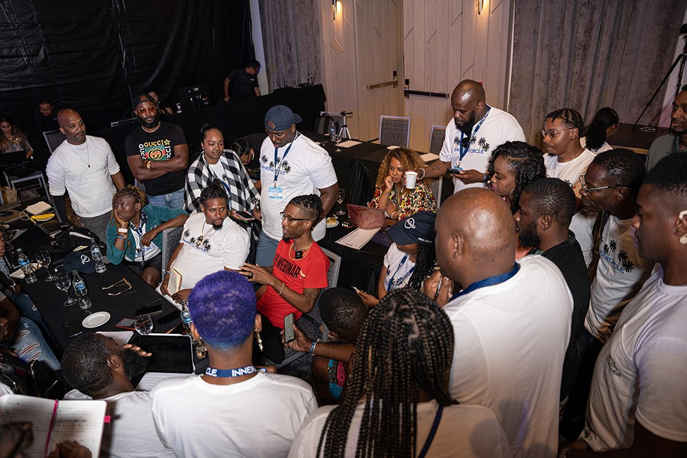 Participants gathered in a circle talking about insights from the event.
