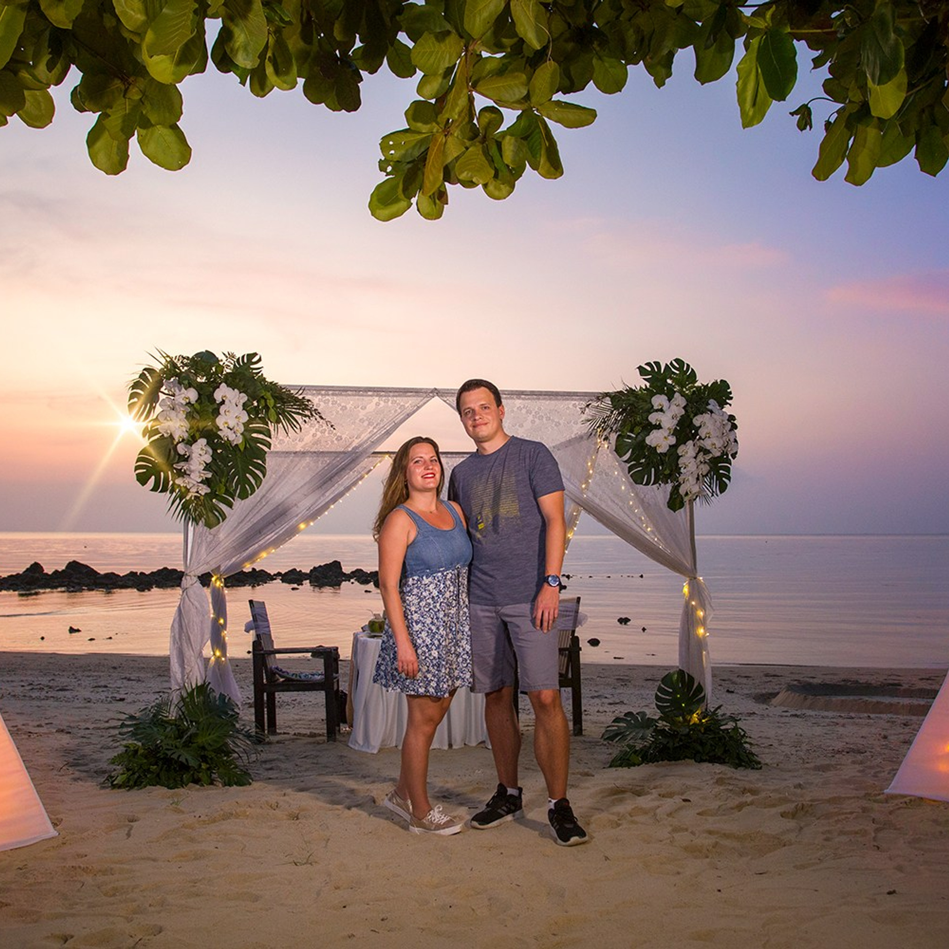 Luxury beach proposal in Koh Samui, Thailand. Private sunset setup with candles, flowers, and ocean view for an unforgettable engagement experience.