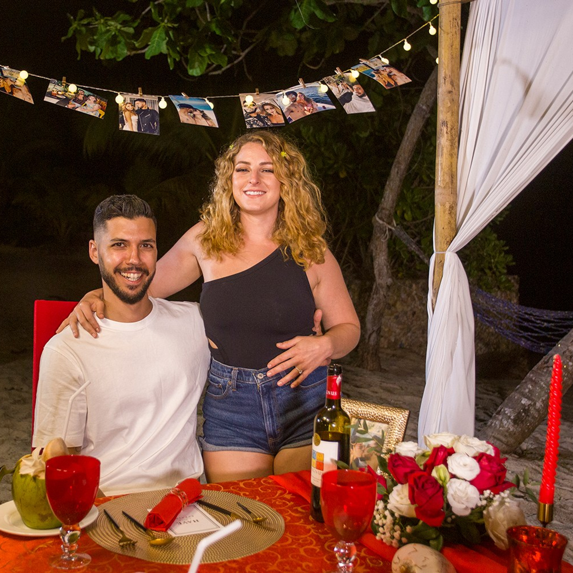 Luxury beach proposal in Koh Samui, Thailand. Private sunset setup with candles, flowers, and ocean view for an unforgettable engagement experience.
